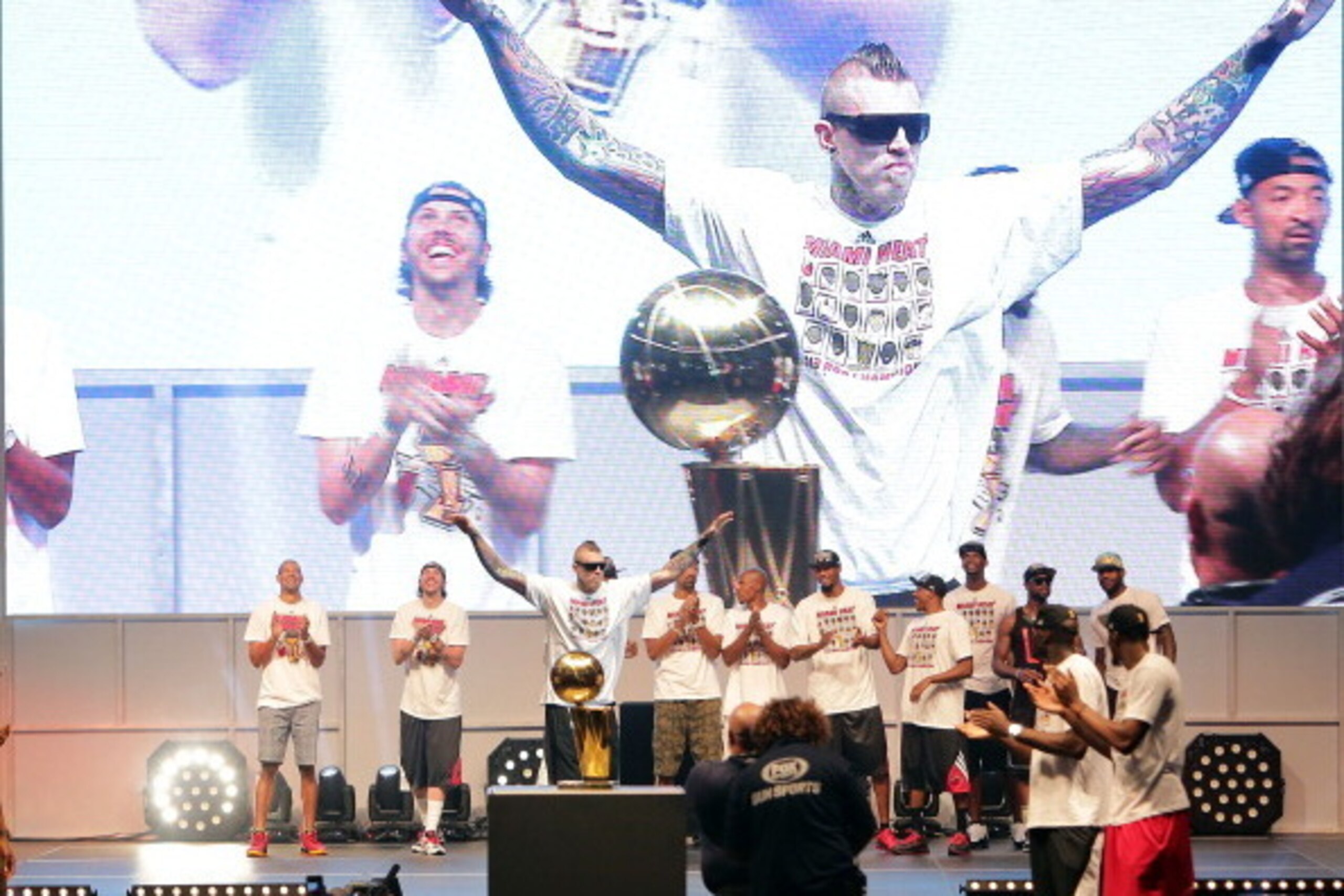 MIAMI, FL - JUNE 24: Players of the Miami Heat celebrate the NBA Championship victory rally at the AmericanAirlines Arena on June 24, 2013 in Miami, Florida. The Miami Heat defeated the San Antonio Spurs in the NBA Finals.  (Photo by Alexander Tamargo/Get