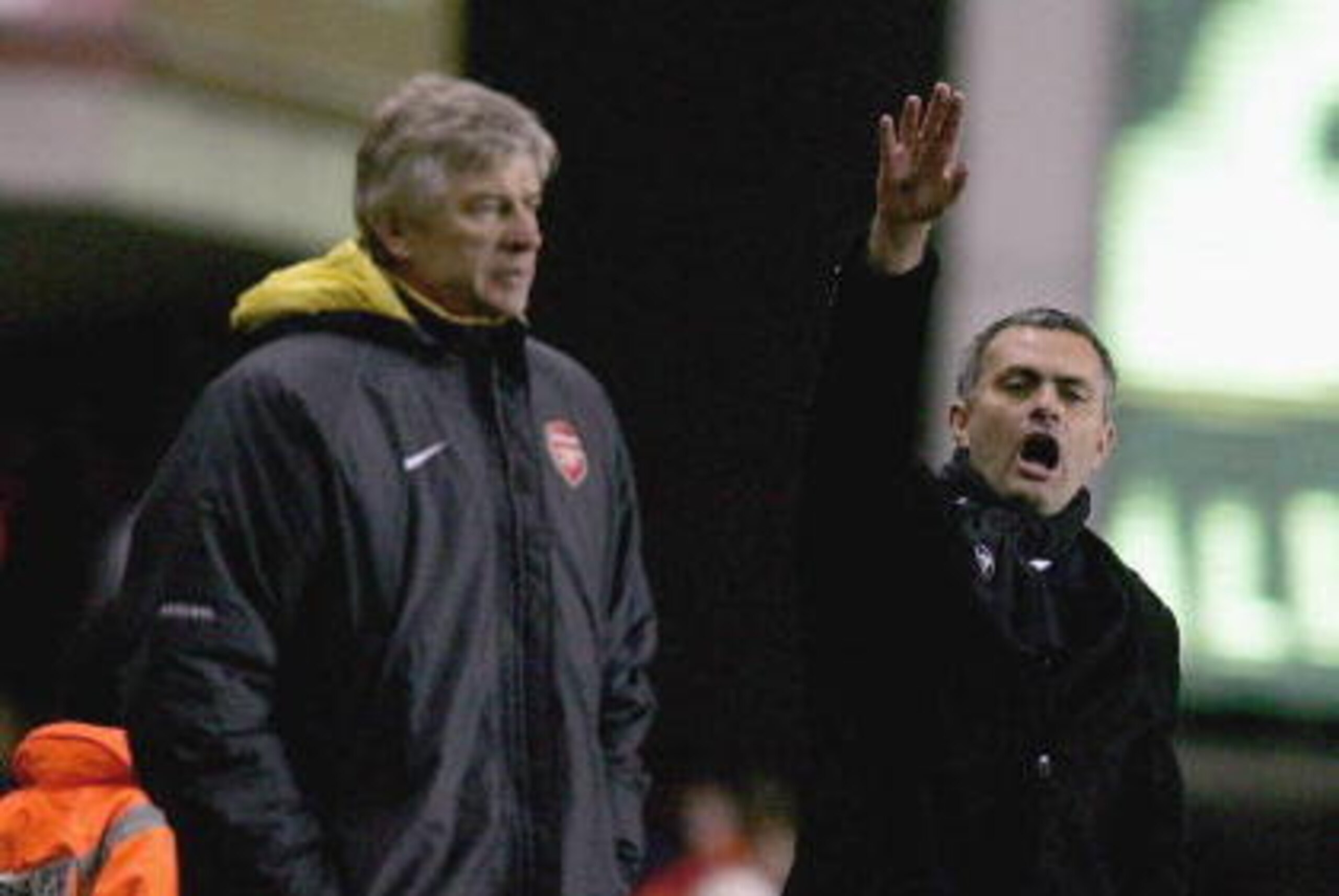 LONDON - DECEMBER 18: Arsenal Manager Arsene Wenger (L) and Chelsea Manager Jose Mourinho (R) give instructions from the sidelines during the Barclays Premiership match between Arsenal and Chelsea at Highbury on December 18, 2005 in London, England. (Ph LONDON - DECEMBER 18: Arsenal Manager Arsene Wenger (L) and Chelsea Manager Jose Mourinho (R) give instructions from the sidelines during the Barclays Premiership match between Arsenal and Chelsea at Highbury on December 18, 2005 in London, England. (Ph