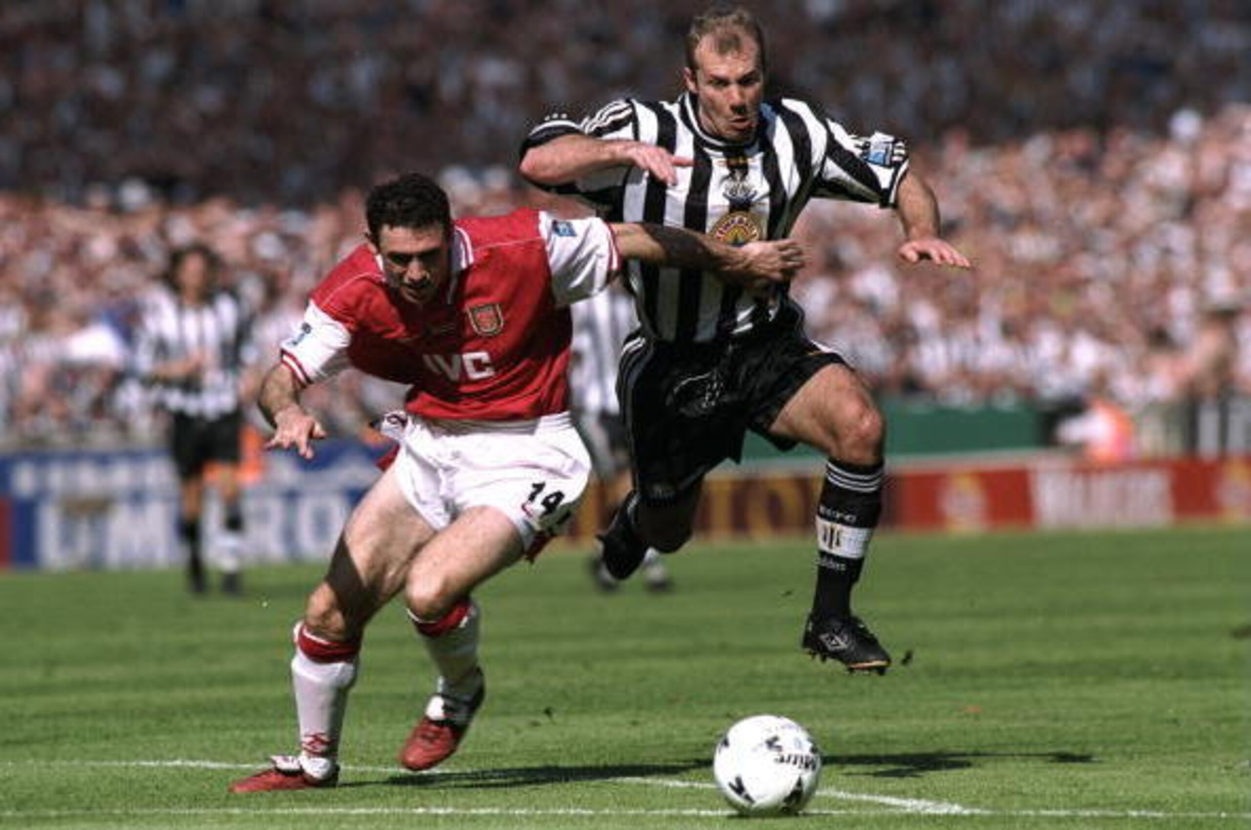 16 May 1998:  Alan Shearer of Newcastle United takes on Martin Keown of Arsenal during the FA Cup final at Wembley Stadium in London. Arsenal won the match 2-0. \ Mandatory Credit: Shaun  Botterill/Allsport
