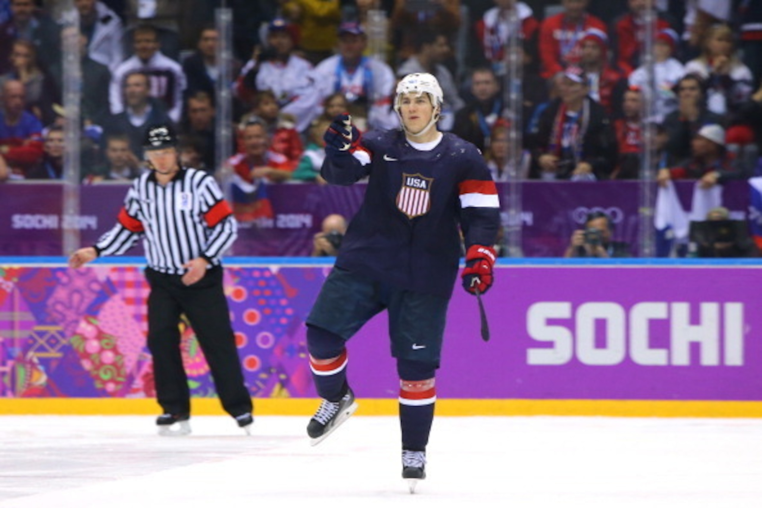SOCHI, RUSSIA - FEBRUARY 15: T.J. Oshie #74 of the United States celebrates after scoring on a shootout against Sergei Bobrovski #72 of Russia to win the Men's Ice Hockey Preliminary Round Group A game on day eight of the Sochi 2014 Winter Olympics at Bo SOCHI, RUSSIA - FEBRUARY 15: T.J. Oshie #74 of the United States celebrates after scoring on a shootout against Sergei Bobrovski #72 of Russia to win the Men's Ice Hockey Preliminary Round Group A game on day eight of the Sochi 2014 Winter Olympics at Bo