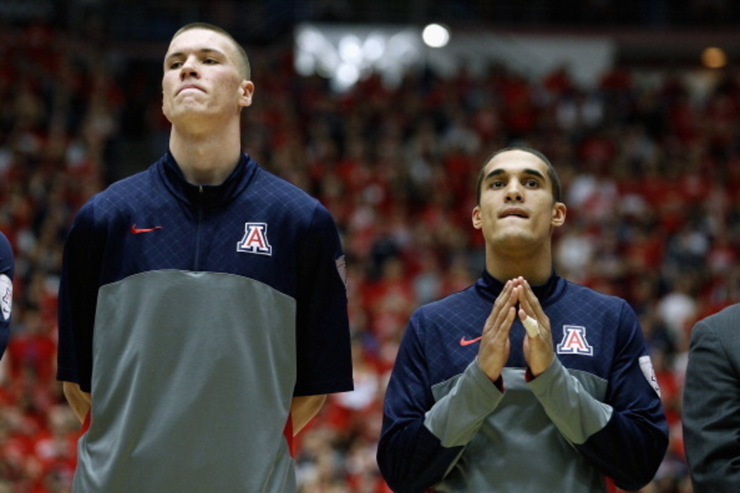 TUCSON, AZ - FEBRUARY 09:  Kaleb Tarczewski #35 (L) and Nick Johnson #13 of the Arizona Wildcats stand before the start of a college basketball game against the Oregon State Beavers at McKale Center on February 9, 2014 in Tucson, Arizona.  (Photo by Ralph