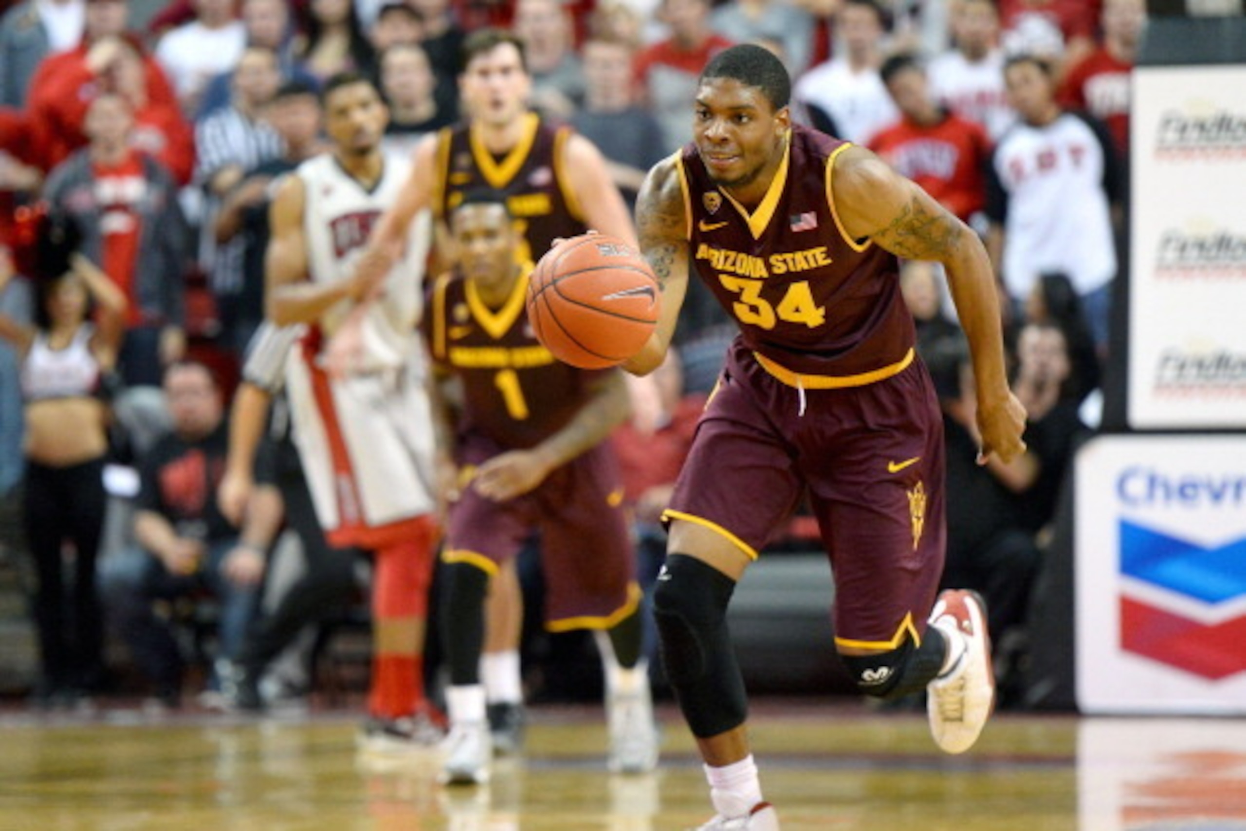 LAS VEGAS, NV - NOVEMBER 19:  Jermaine Marshall #34 of the Arizona State Sun Devils brings the ball up the court after a steal against the UNLV Rebels during their game at the Thomas & Mack Center on November 19, 2013 in Las Vegas, Nevada. Arizona State w