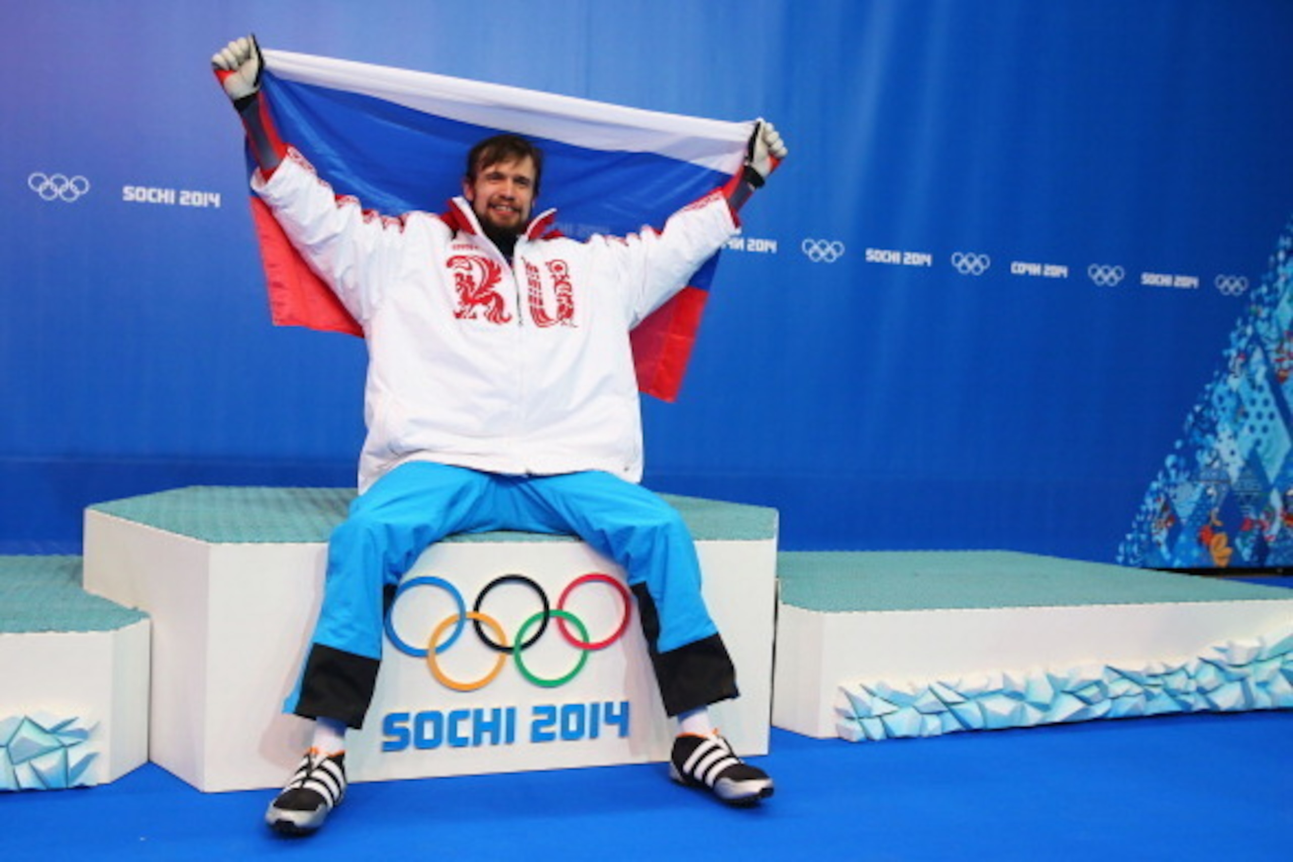 SOCHI, RUSSIA - FEBRUARY 15: Gold medalist Alexander Tretiakov of Russia celebrates during the flower ceremony for the Men's Skeleton on Day 8 of the Sochi 2014 Winter Olympics at Sliding Center Sanki on February 15, 2014 in Sochi, Russia. (Photo by Ale SOCHI, RUSSIA - FEBRUARY 15: Gold medalist Alexander Tretiakov of Russia celebrates during the flower ceremony for the Men's Skeleton on Day 8 of the Sochi 2014 Winter Olympics at Sliding Center Sanki on February 15, 2014 in Sochi, Russia. (Photo by Ale