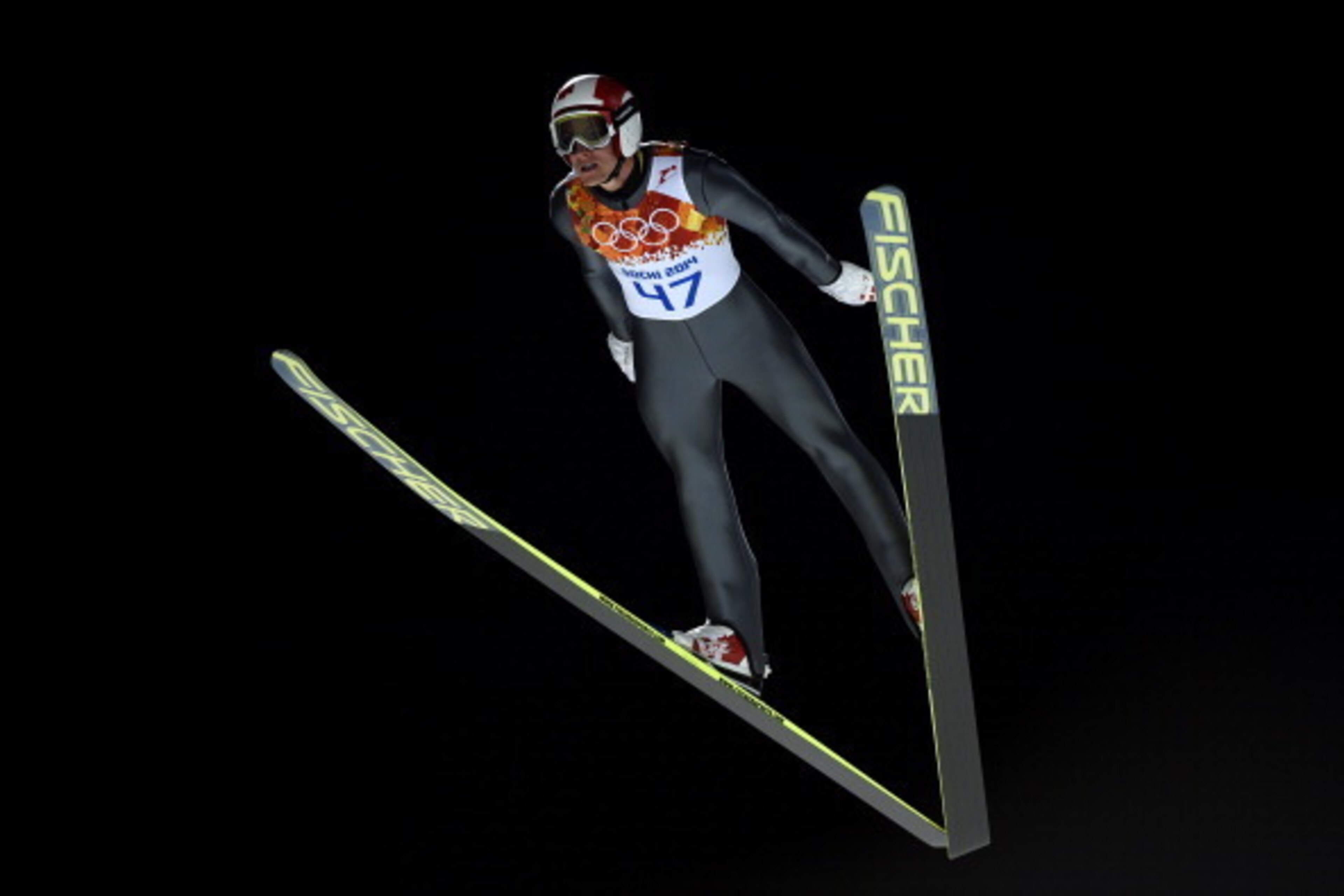 SOCHI, RUSSIA - FEBRUARY 15: Gregor Schlierenzauer of Austria jumps during the Men's Large Hill Individual 1st Round on day 8 of the Sochi 2014 Winter Olympics at the RusSki Gorki Ski Jumping Center on February 15, 2014 in Sochi, Russia.  (Photo by Lars B