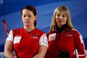 RIGA, LATVIA - MARCH 24:  Debbie McCormick (L) and Erika Brown of USA look on in the Bronze medal match between USA and Canada on Day 9 of the Titlis Glacier Mountain World Women's Curling Championship at the Volvo Sports Centre on March 24, 2013 in Riga,