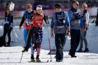 SOCHI, RUSSIA - FEBRUARY 15:  Kikkan Randall of the United States leaves the course after finishing the first leg of the Women's 4 x 5 km Relay during day eight of the Sochi 2014 Winter Olympics at Laura Cross-country Ski & Biathlon Center on February 15,