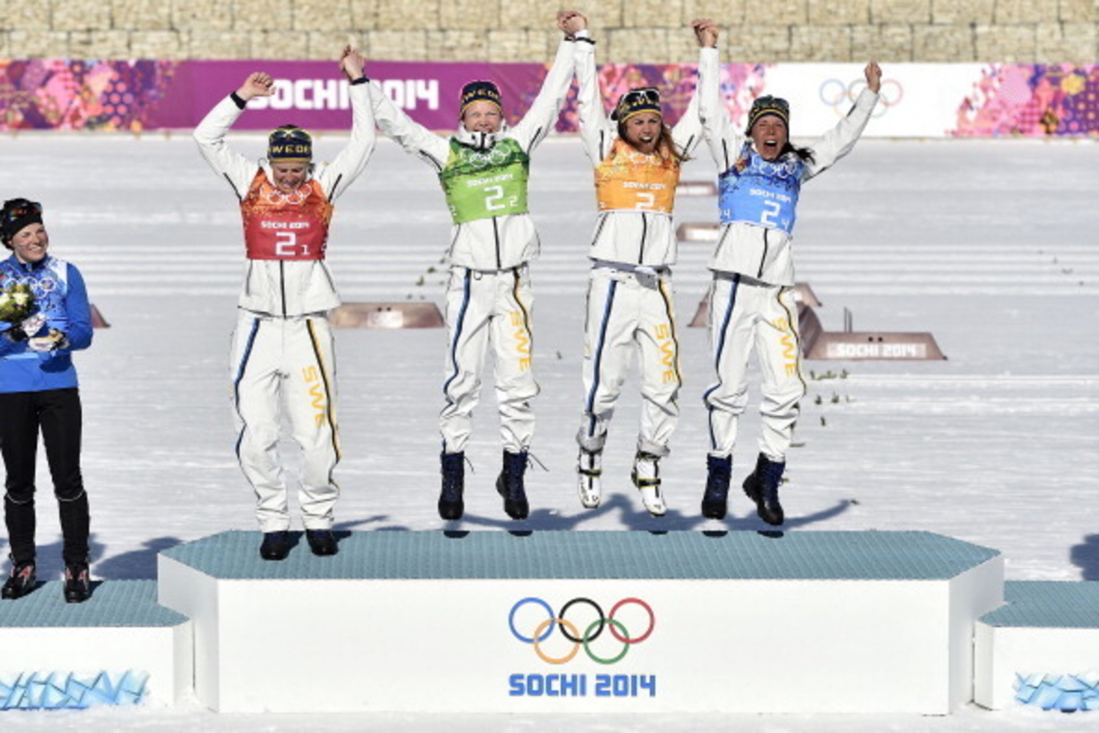 SOCHI, RUSSIA - FEBRUARY 15: (FRANCE OUT) Ida Ingemarsdotter of Sweden wins gold medal,Emma Wiken of Sweden wins gold medal, Anna Haag of Sweden wins gold medal, Charlotte Kalla of Sweden wins gold medal during the Cross-Country Women's Relay at the Laura