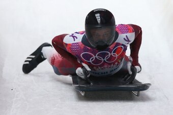 SOCHI, RUSSIA - FEBRUARY 15:  Martins Dukurs of Latvia ends his run during the Men's Skeleton on Day 8 of the Sochi 2014 Winter Olympics at Sliding Center Sanki on February 15, 2014 in Sochi, Russia.  (Photo by Alex Livesey/Getty Images)