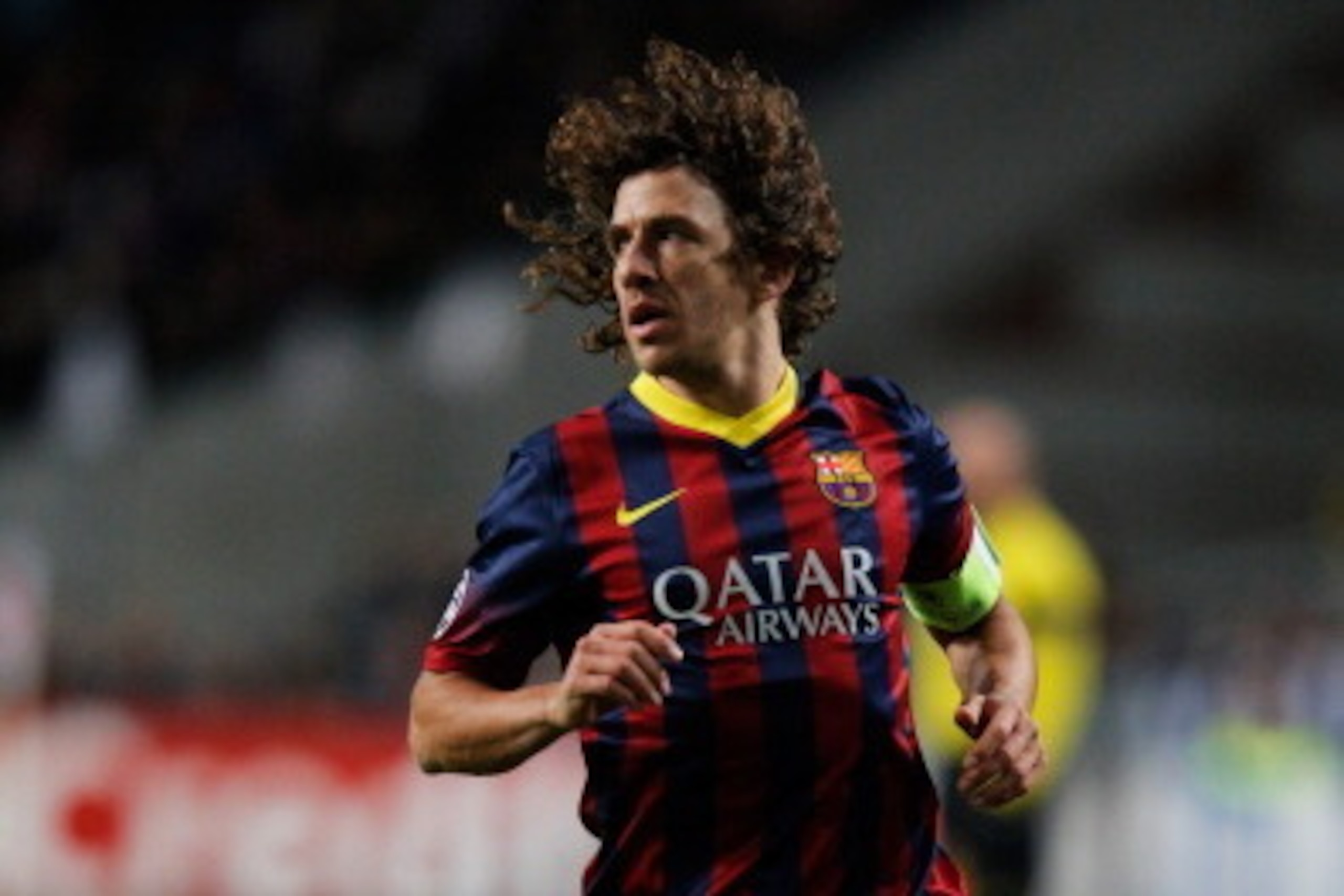 AMSTERDAM, NETHERLANDS - NOVEMBER 26: Carles Puyol of Barcelona in action during the UEFA Champions League Group H match between Ajax Amsterdam and FC Barcelona at Amsterdam Arena on November 26, 2013 in Amsterdam, Netherlands. (Photo by Dean Mouhtaropo AMSTERDAM, NETHERLANDS - NOVEMBER 26: Carles Puyol of Barcelona in action during the UEFA Champions League Group H match between Ajax Amsterdam and FC Barcelona at Amsterdam Arena on November 26, 2013 in Amsterdam, Netherlands. (Photo by Dean Mouhtaropo