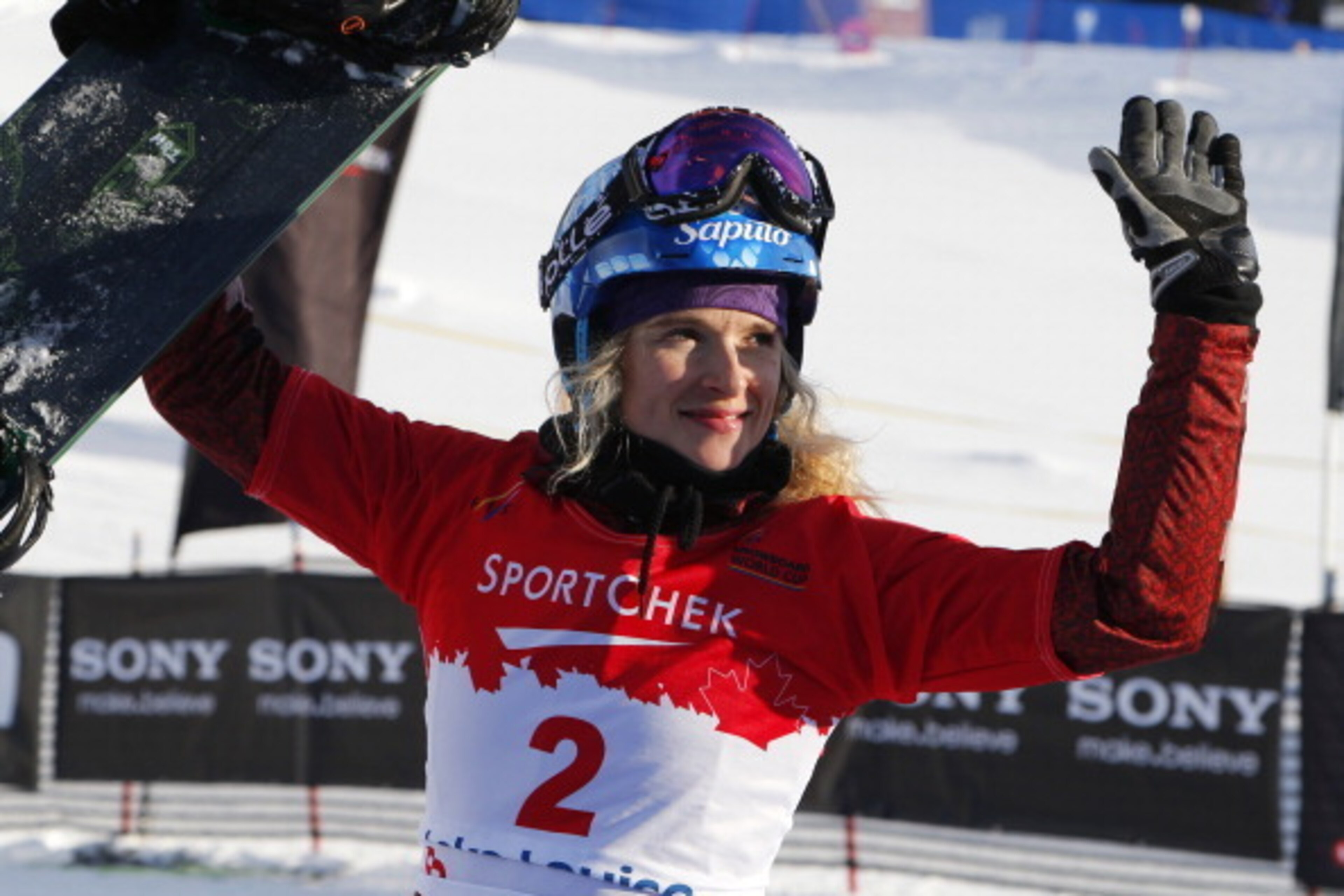 LAKE LOUISE, CANADA - DECEMBER 21: Dominique Maltais of Canada celebrates her second place finish during the women's finals at the FIS Snowboard Cross World Cup December 21, 2013 in Lake Louise, Alberta, Canada. (Photo by Todd Korol/Getty Images)