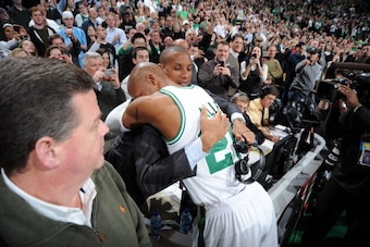 BOSTON, MA - FEBRUARY 10: TNT Analyst and former record holder Reggie Miller and Ray Allen #20 of the Boston Celtics celebrate after Ray Allen breaks the NBA All-time three point record against the Los Angeles Lakers during the game on February 10, 2011 a