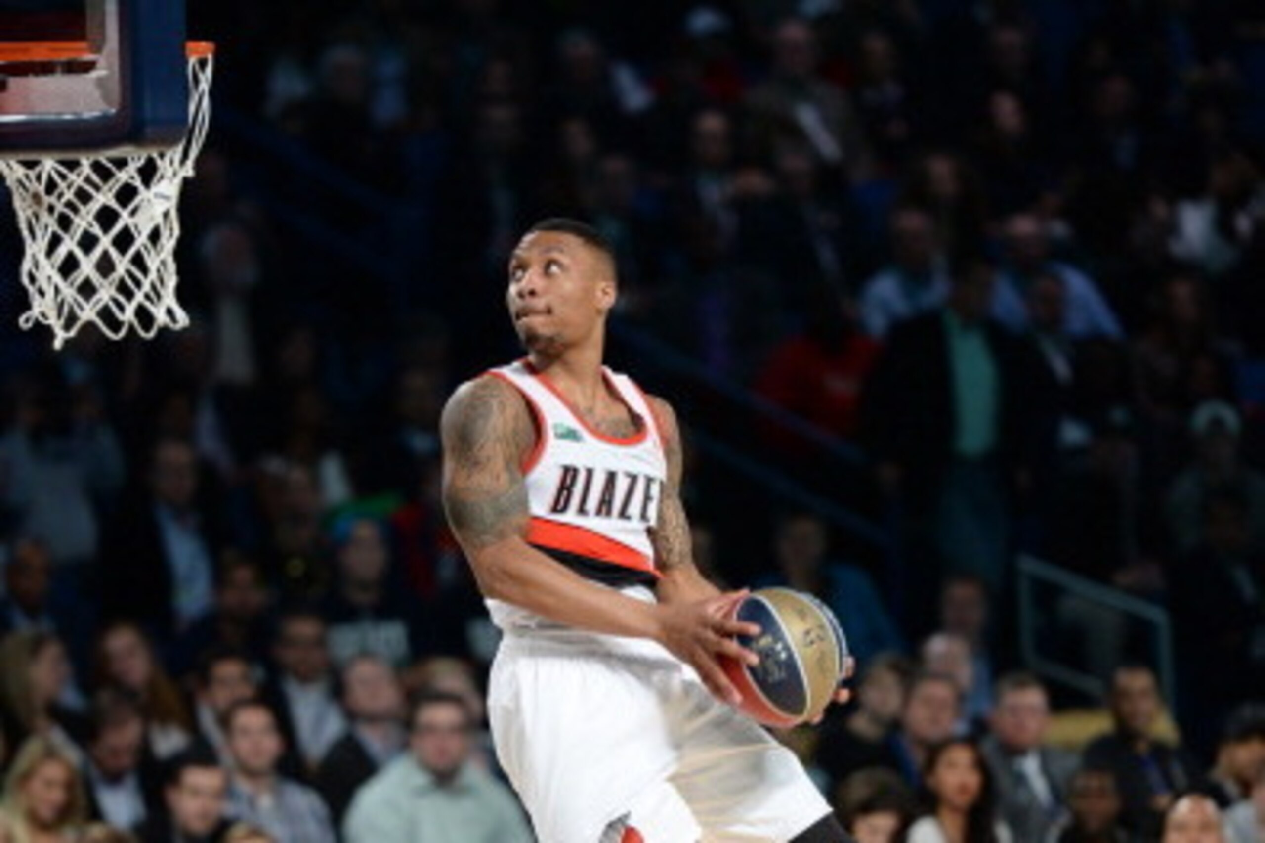NEW ORLEANS, LA - FEBRUARY 15:  Damian Lillard #0 of the Portland Trail Blazers participates in the Sprite Slam Dunk Contest on State Farm All-Star Saturday Night as part of the 2014 All-Star Weekend at Smoothie King Center on February 15, 2014 in New Orl
