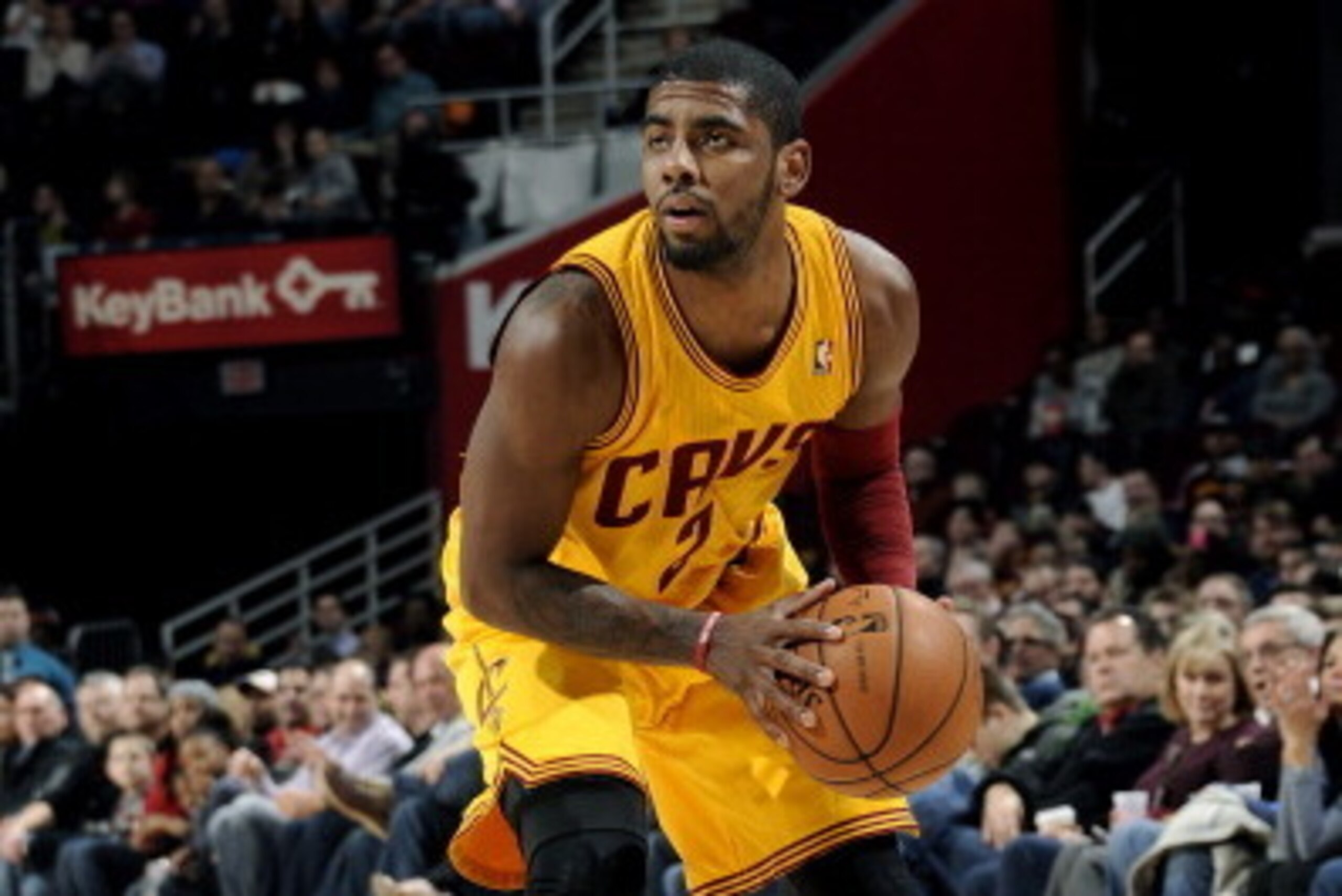 CLEVELAND, OH - FEBRUARY 9:  Kyrie Irving #2 of the Cleveland Cavaliers handles the ball against the Memphis Grizzlies at The Quicken Loans Arena on February 9, 2014 in Cleveland, Ohio. NOTE TO USER: User expressly acknowledges and agrees that, by downloa