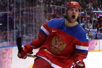 SOCHI, RUSSIA - FEBRUARY 16:  Alexander Radulov #47 of Russia celebrates after scoring a goal in a shoot out against Jan Laco #50 of Slovakia during the Men's Ice Hockey Preliminary Round Group A game on day nine of the Sochi 2014 Winter Olympics at Bolsh