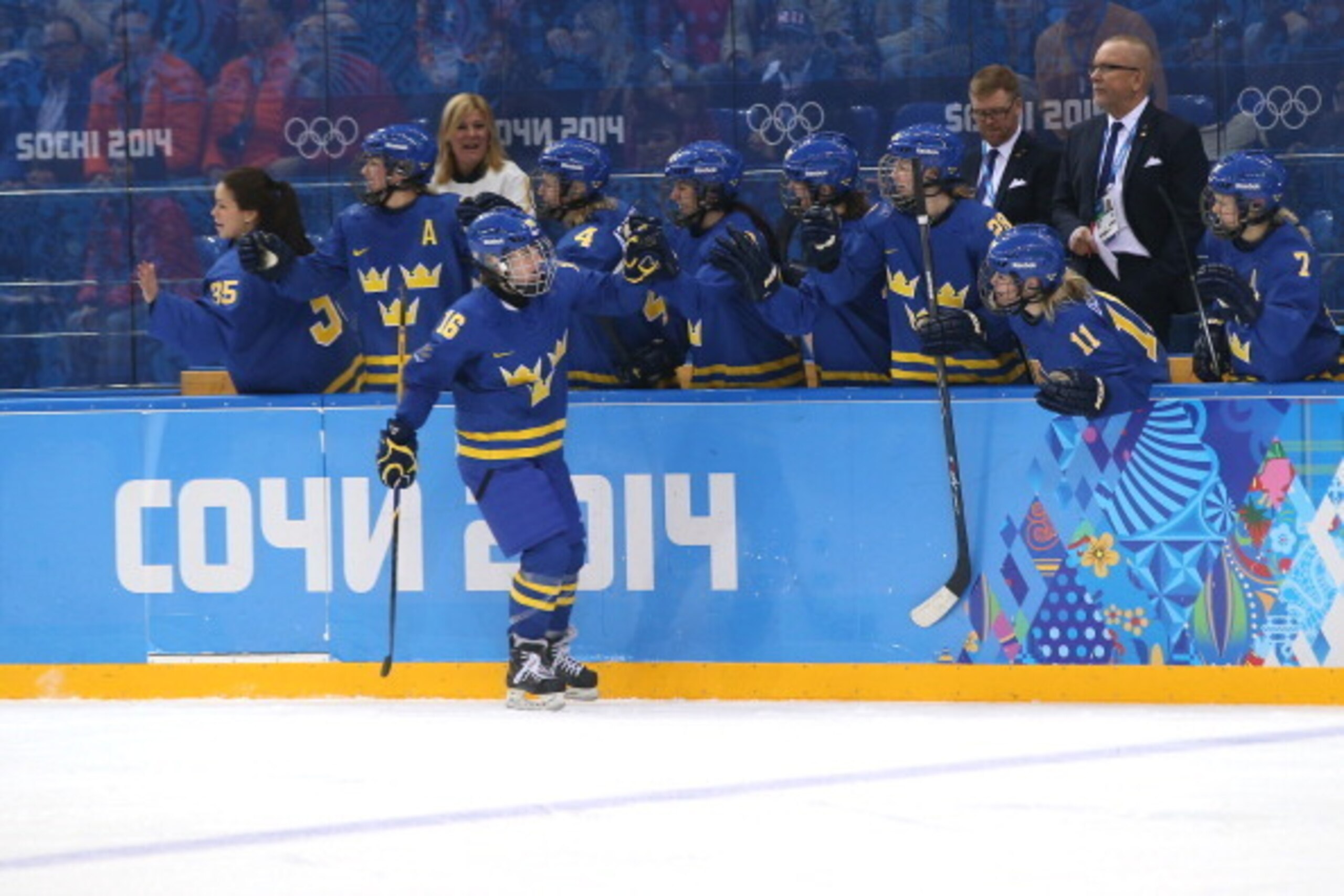SOCHI, RUSSIA - FEBRUARY 11: Pernilla Winberg #16 of Sweden celebrates the fourth goal against Germany with her teammates in the third period during the Women's Ice Hockey Preliminary Round Group B game on day four of the Sochi 2014 Winter Olympics at Sha SOCHI, RUSSIA - FEBRUARY 11: Pernilla Winberg #16 of Sweden celebrates the fourth goal against Germany with her teammates in the third period during the Women's Ice Hockey Preliminary Round Group B game on day four of the Sochi 2014 Winter Olympics at Sha