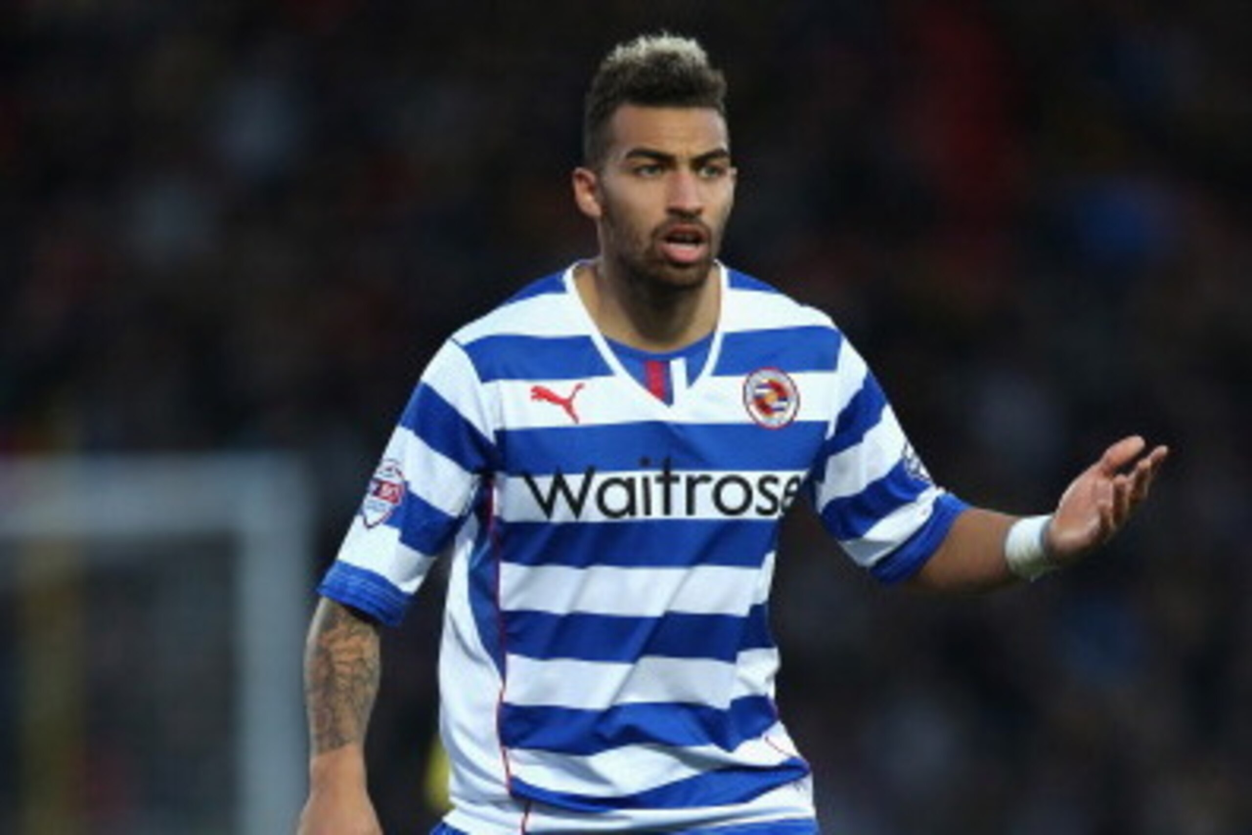 WATFORD, ENGLAND - JANUARY 11:  Danny Williams of Reading in action during the Sky Bet Championship match between Watford and Reading at Vicarage Road on January 11, 2014 in Watford, England,  (Photo by Mark Thompson/Getty Images)