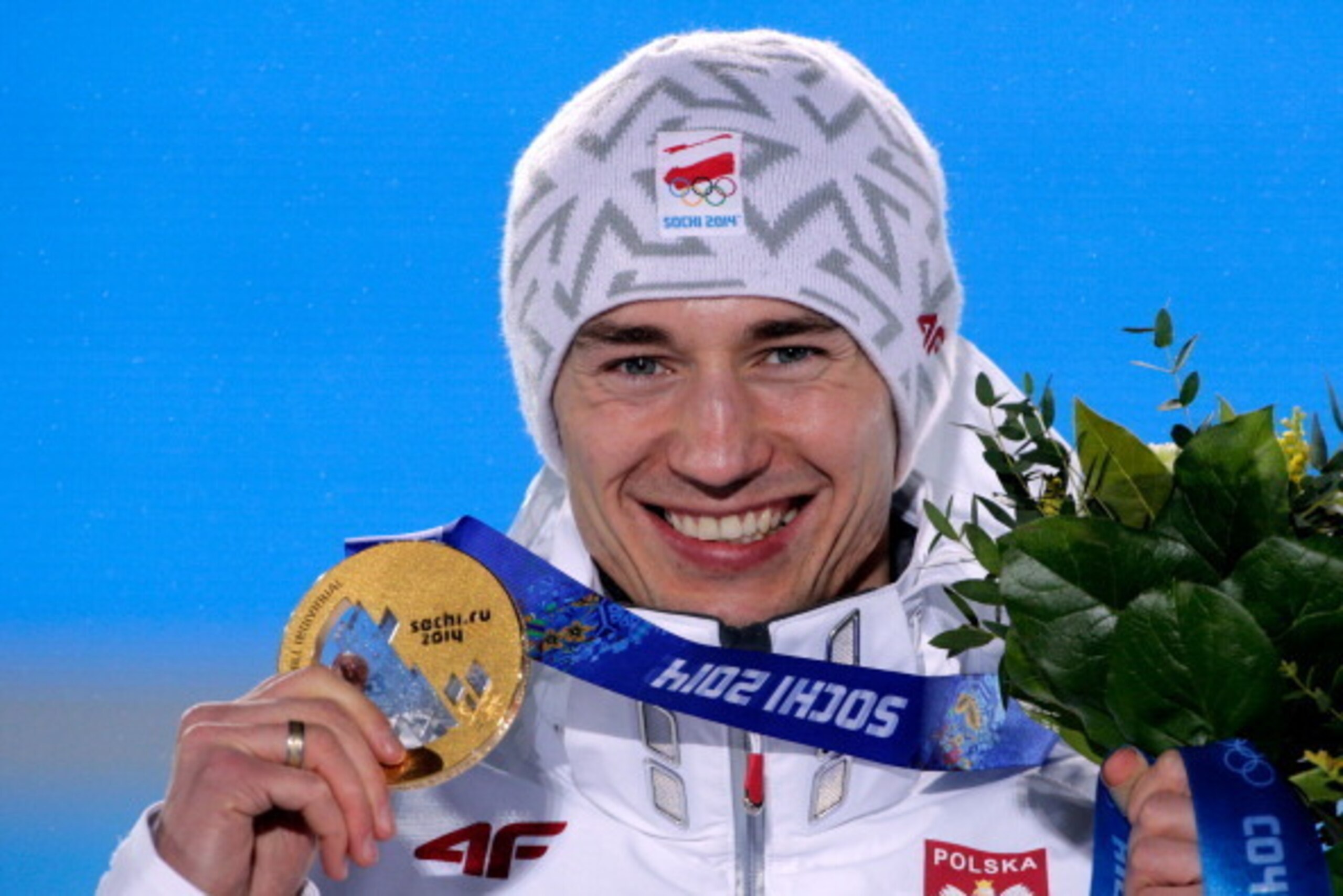 SOCHI, RUSSIA - FEBRUARY 16: Gold medalist Kamil Stoch of Poland celebrates on the podium during the medal ceremony for the Men's Large Hill Individual on day 9 of the Sochi 2014 Winter Olympics at Medals Plaza on February 16, 2014 in Sochi, Russia. (Phot SOCHI, RUSSIA - FEBRUARY 16: Gold medalist Kamil Stoch of Poland celebrates on the podium during the medal ceremony for the Men's Large Hill Individual on day 9 of the Sochi 2014 Winter Olympics at Medals Plaza on February 16, 2014 in Sochi, Russia. (Phot
