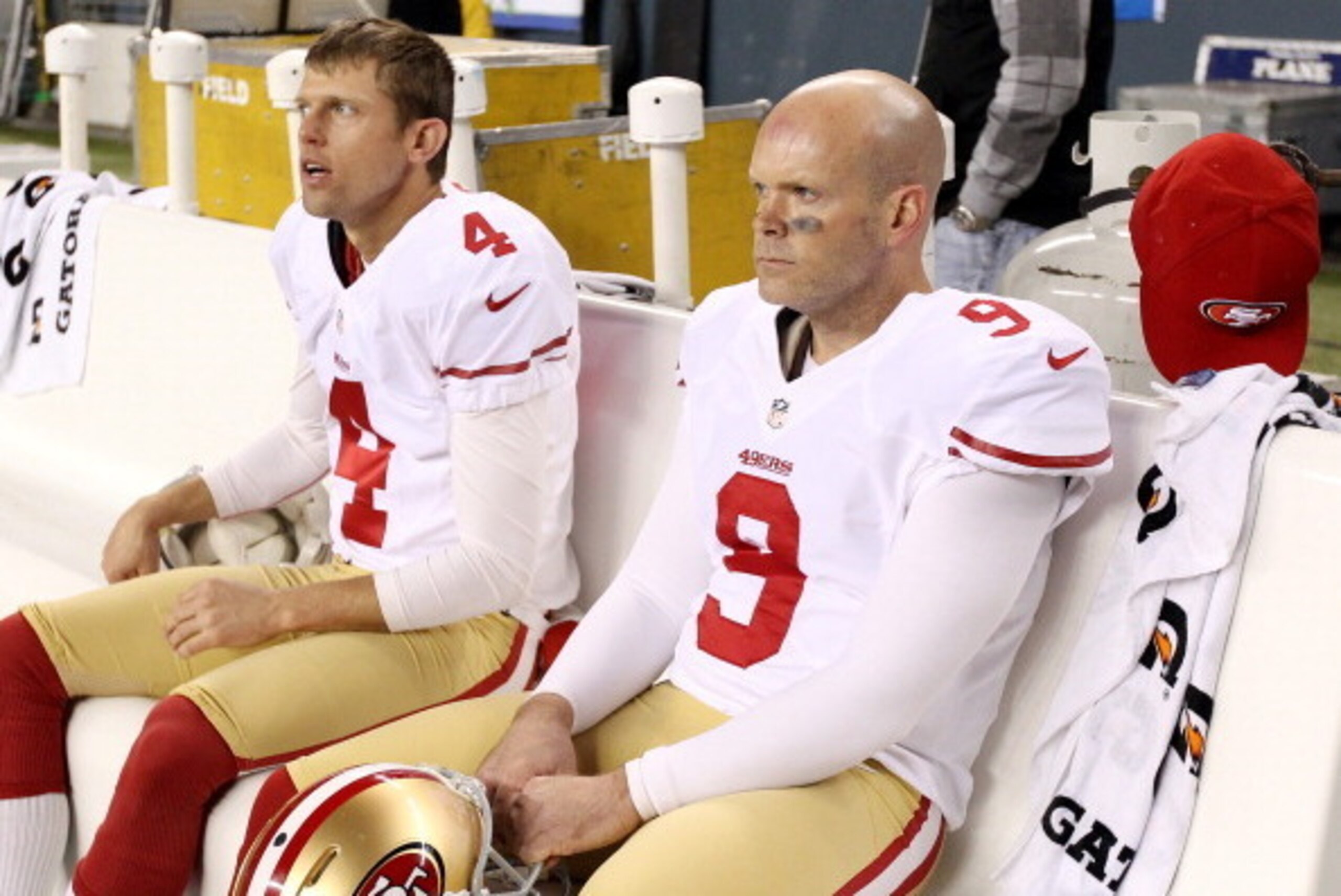 SEATTLE, WA - JANUARY 19: Kicker Phil Dawson #9 and punter Andy Lee #4 of the San Francisco 49ers sit on the bench during the 2014 NFC Championship against the Seattle Seahawks at CenturyLink Field on January 19, 2014 in Seattle, Washington. (Photo by Ch SEATTLE, WA - JANUARY 19: Kicker Phil Dawson #9 and punter Andy Lee #4 of the San Francisco 49ers sit on the bench during the 2014 NFC Championship against the Seattle Seahawks at CenturyLink Field on January 19, 2014 in Seattle, Washington. (Photo by Ch