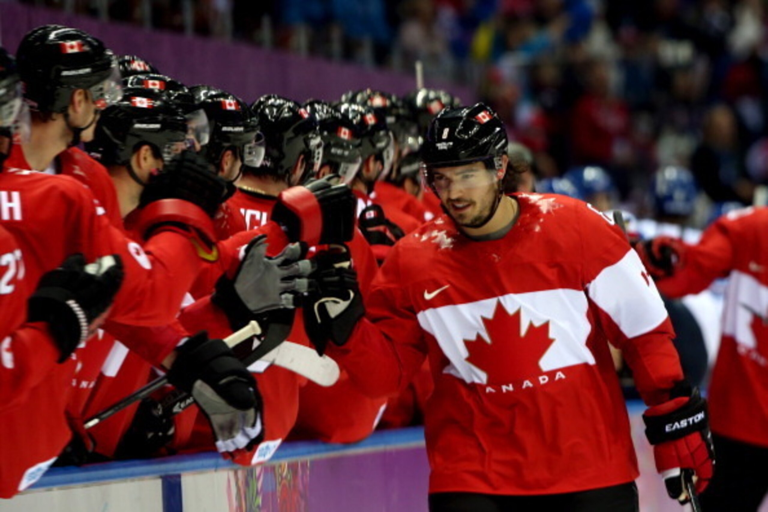 SOCHI, RUSSIA - FEBRUARY 16:  Drew Doughty #8 of Canada celebrates with his teammates after scoring a goal in the first period against Tuukka Rask #40 of Finland during the Men's Ice Hockey Preliminary Round Group B game on day nine of the Sochi 2014 Wint
