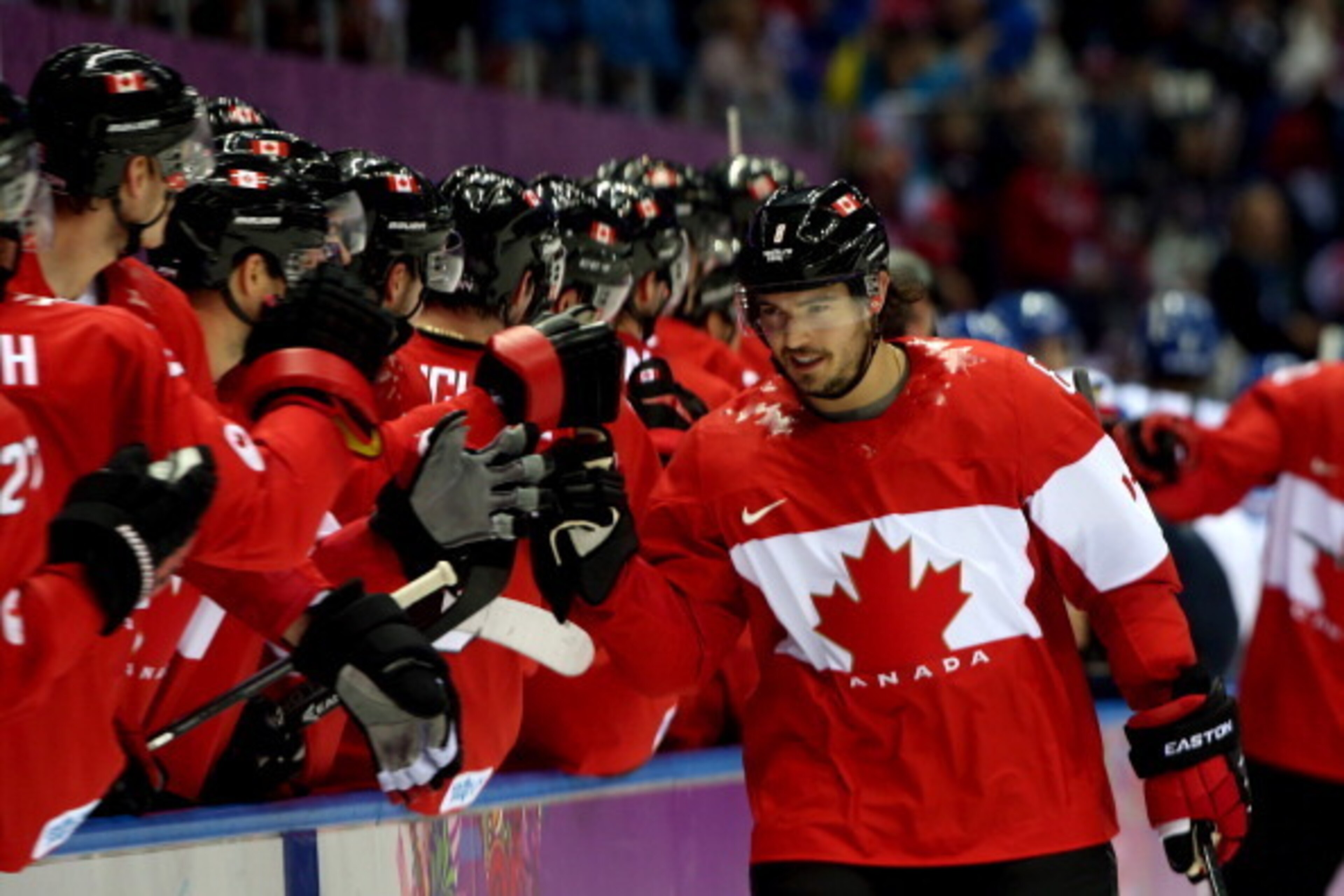SOCHI, RUSSIA - FEBRUARY 16:  Drew Doughty #8 of Canada celebrates with his teammates after scoring a goal in the first period against Tuukka Rask #40 of Finland during the Men's Ice Hockey Preliminary Round Group B game on day nine of the Sochi 2014 Wint