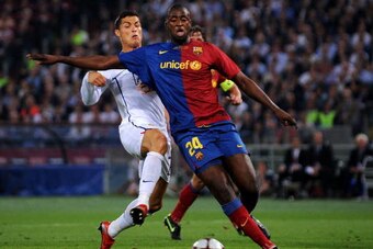 ROME - MAY 27:  Cristiano Ronaldo of Manchester United battles for the ball with Yaya Toure of Barcelona during the Champions League Final match between Barcelona and Manchester United at the Stadio Olimpico on May 27, 2009 in Rome, Italy. Barcelona won 2