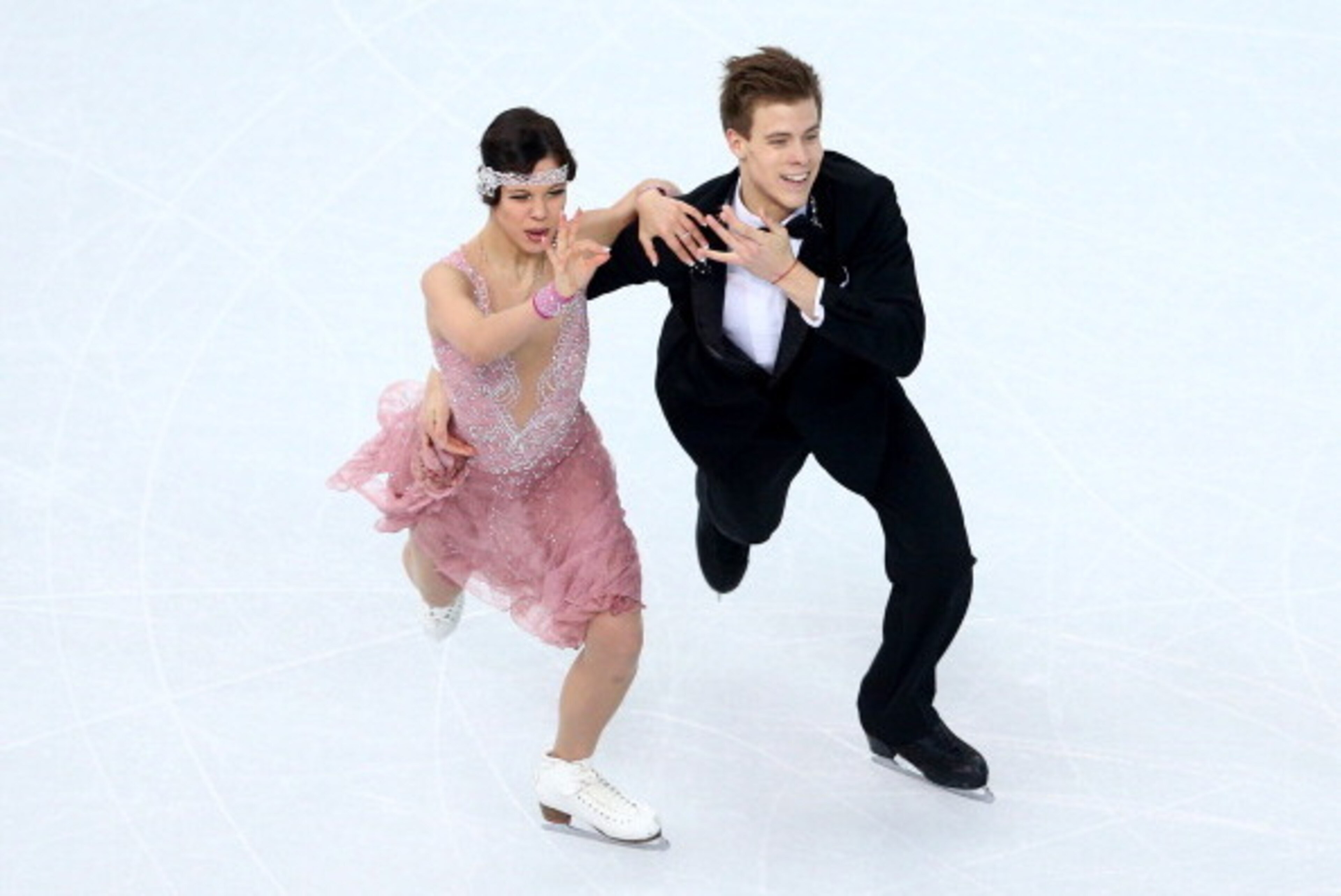 SOCHI, RUSSIA - FEBRUARY 16:  Elena Ilinykh and Nikita Katsalapov of Russia compete during the Figure Skating Ice Dance Short Dance on day 9 of the Sochi 2014 Winter Olympics at Iceberg Skating Palace on February 16, 2014 in Sochi, Russia.  (Photo by Paul
