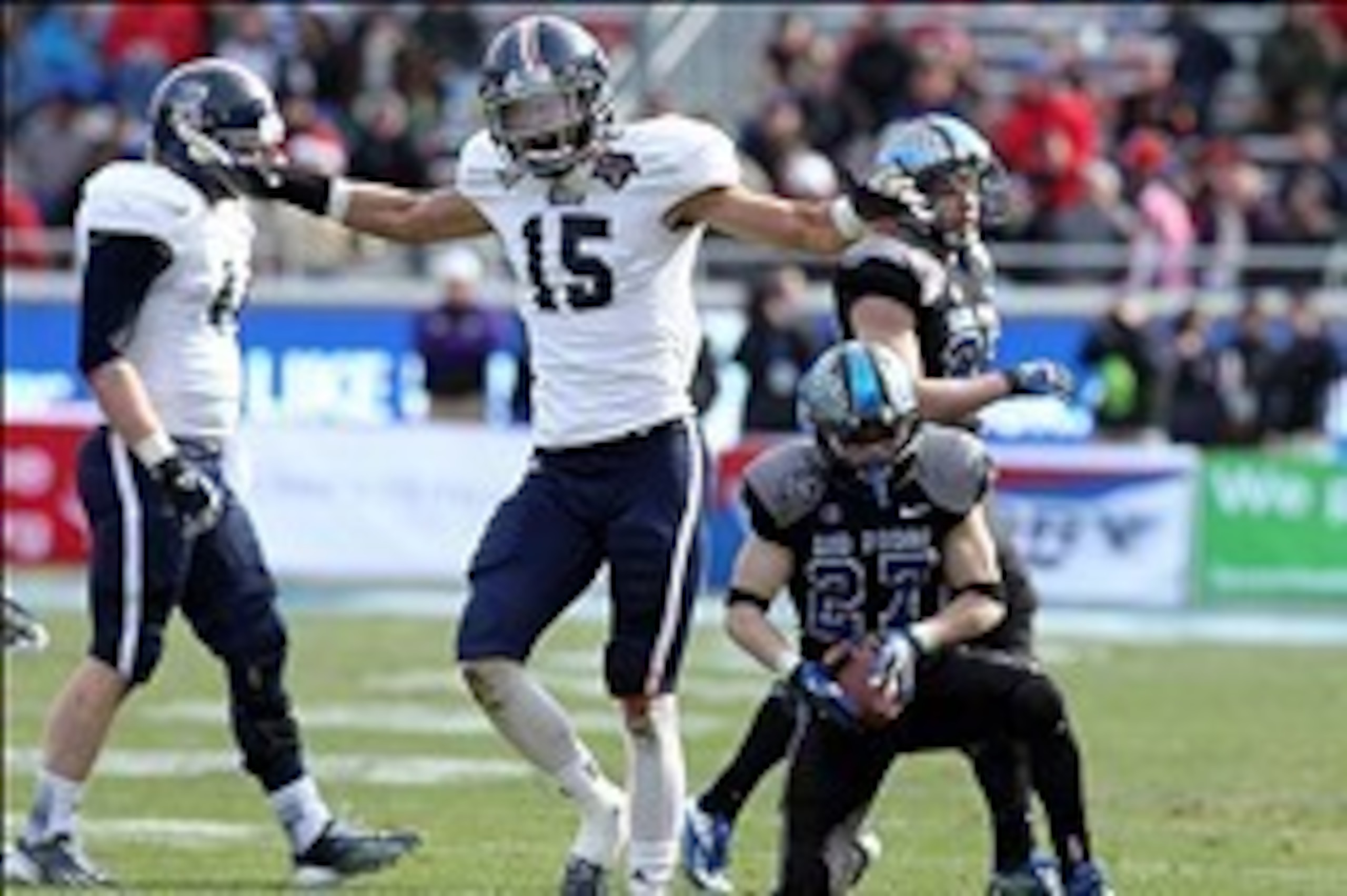 Dec 29, 2012; Fort Worth, TX, USA; Rice Owls cornerback Phillip Gaines (15) celebrates making a tackle against Air Force Falcons wide receiver Ty MacArthur (27) in the Armed Forces Bowl at Amon G. Carter Stadium.  Rice beat Air Force 33-14. Mandatory Cred