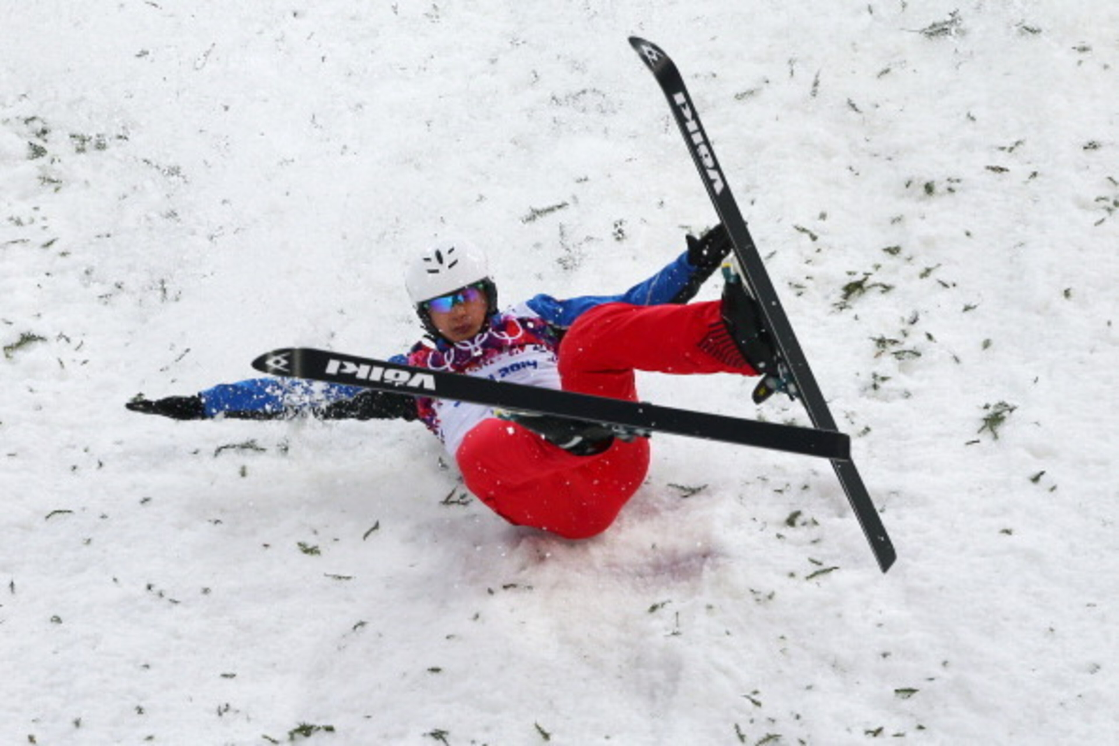 SOCHI, RUSSIA - FEBRUARY 17:  Zhongqing Liu of China crashes in the Freestyle Skiing Men's Aerials Qualification on day ten of the 2014 Winter Olympics at Rosa Khutor Extreme Park on February 17, 2014 in Sochi, Russia.  (Photo by Mike Ehrmann/Getty Images