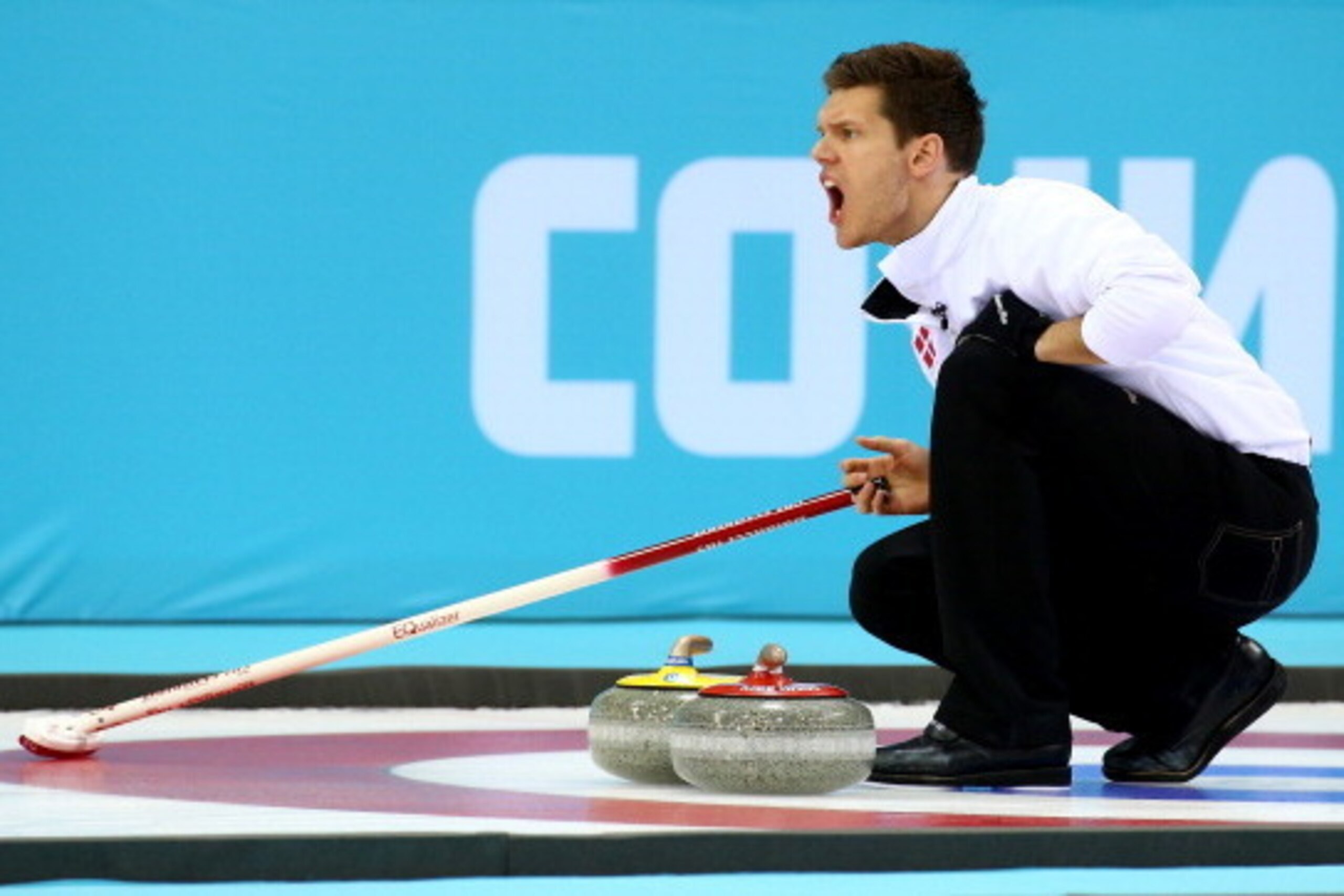 SOCHI, RUSSIA - FEBRUARY 17:  Rasmus Stjerne Hansen of Denmark competes against Norway during the Men's Curling Round Robin on day ten of the Sochi 2014 Winter Olympics at Ice Cube Curling Center on February 17, 2014 in Sochi, Russia.  (Photo by Streeter 