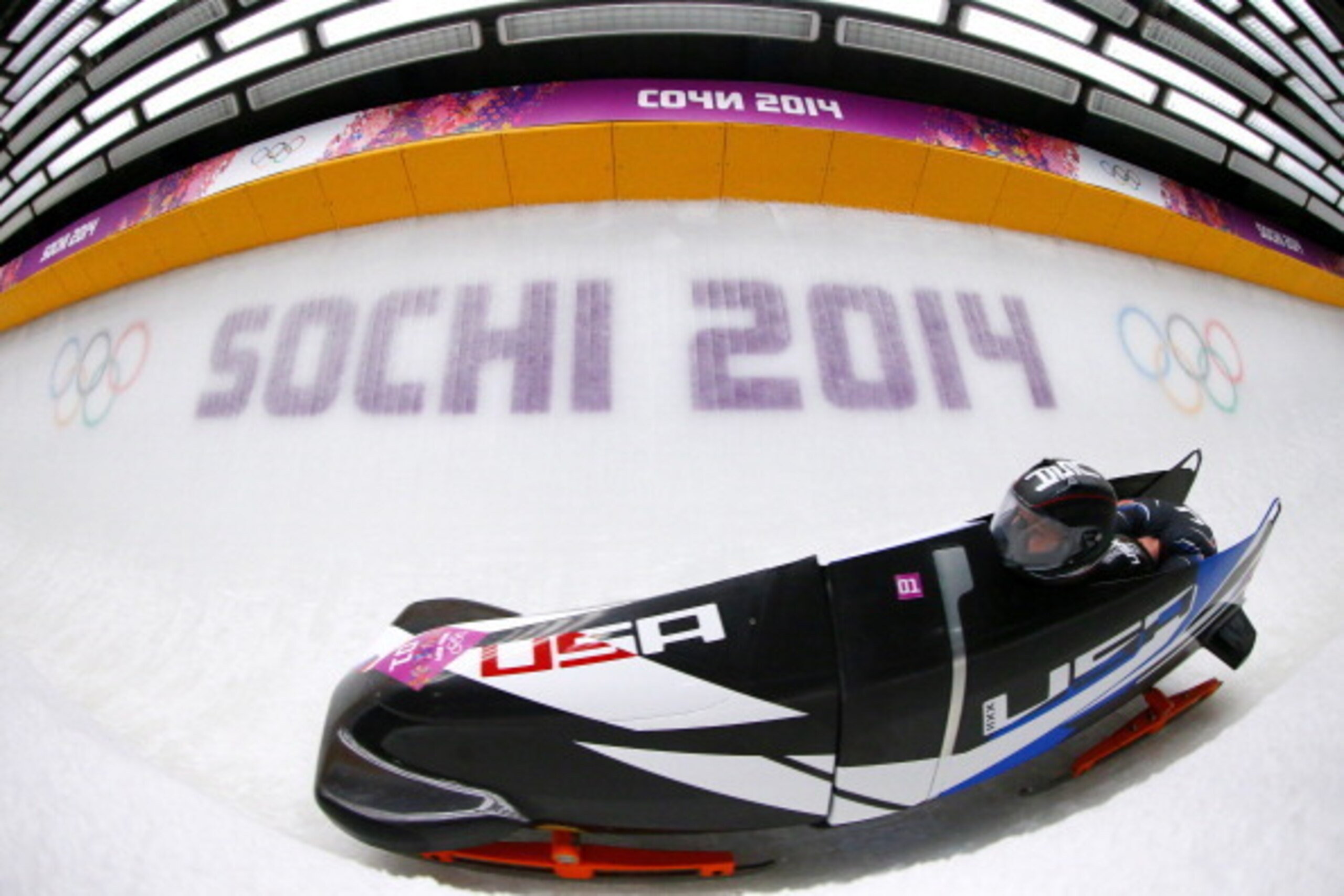 SOCHI, RUSSIA - FEBRUARY 16: Pilot Steven Holcomb and Steven Langton of the United States team 1 make a run during the Men's Two-Man Bobsleigh heats on Day 9 of the Sochi 2014 Winter Olympics at Sliding Center Sanki on February 16, 2014 in Sochi, Russia. 