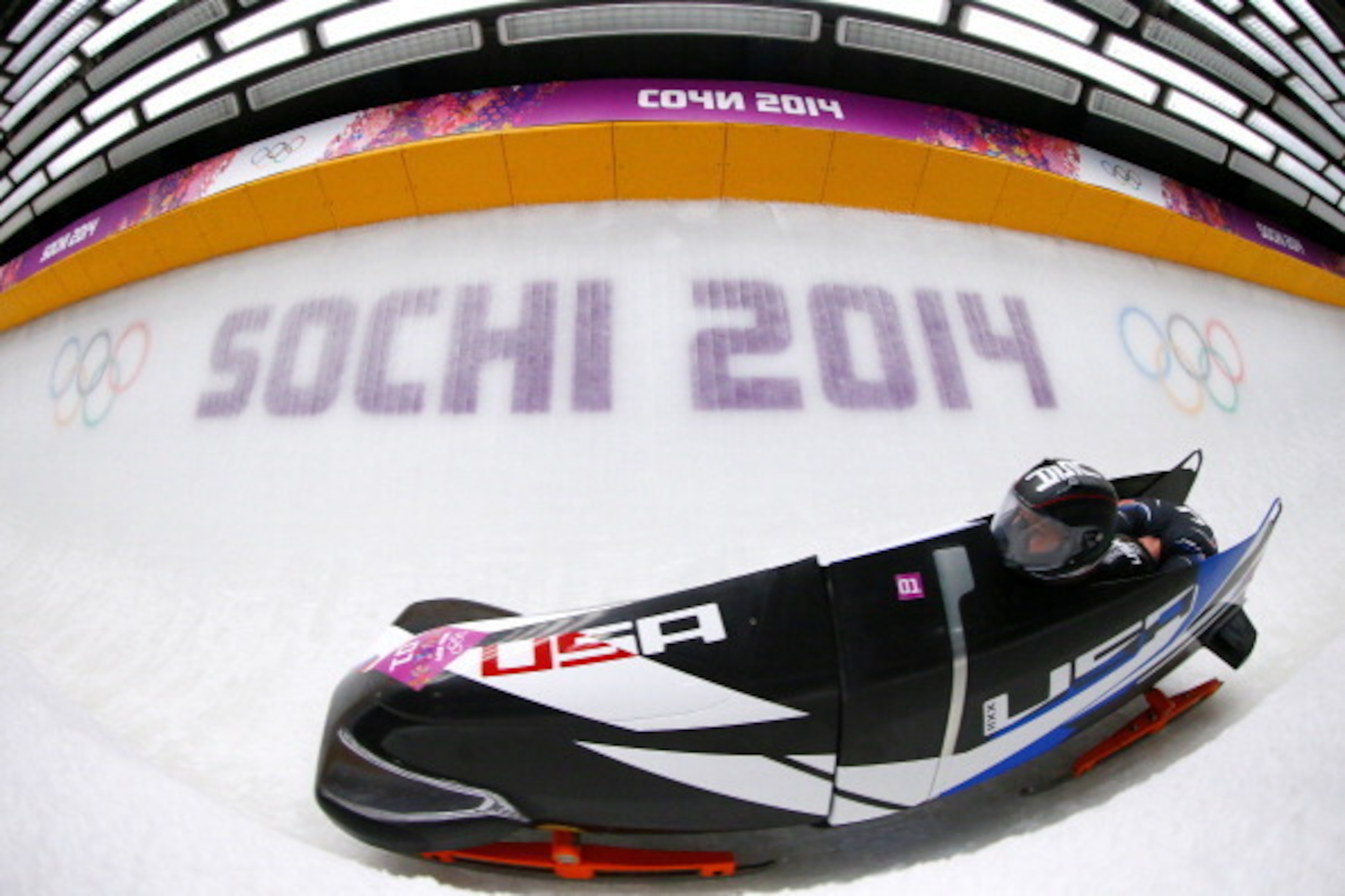 SOCHI, RUSSIA - FEBRUARY 16: Pilot Steven Holcomb and Steven Langton of the United States team 1 make a run during the Men's Two-Man Bobsleigh heats on Day 9 of the Sochi 2014 Winter Olympics at Sliding Center Sanki on February 16, 2014 in Sochi, Russia. 