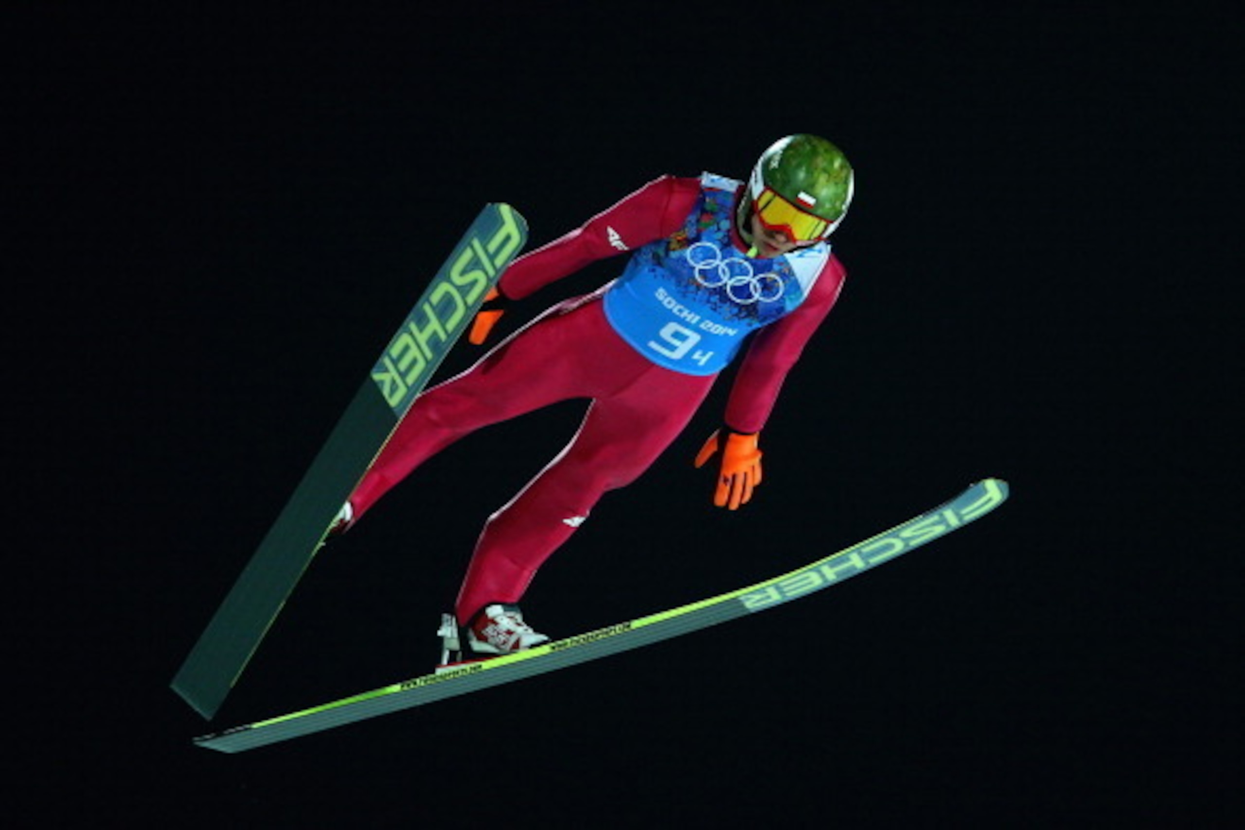 SOCHI, RUSSIA - FEBRUARY 17: Kamil Stoch of Poland jumps during the Men's Team Ski Jumping trial on day 10 of the Sochi 2014 Winter Olympics at the RusSki Gorki Ski Jumping Center on February 17, 2014 in Sochi, Russia.  (Photo by Paul Gilham/Getty Images)