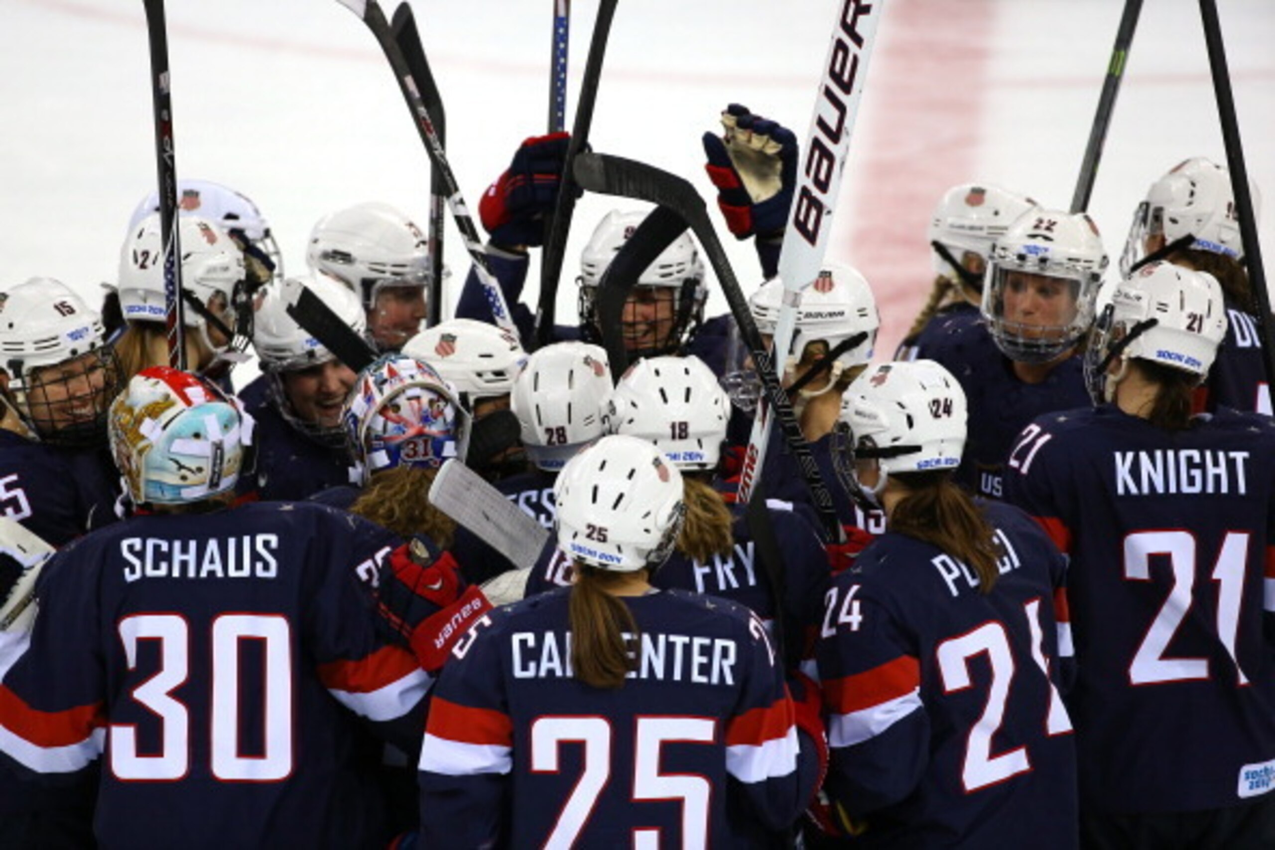 SOCHI, RUSSIA - FEBRUARY 17:  The United States celebrate after defeating Sweden 6-1 during the Women's Ice Hockey Playoffs Semifinal game on day ten of the Sochi 2014 Winter Olympics at Shayba Arena on February 17, 2014 in Sochi, Russia.  (Photo by Doug 