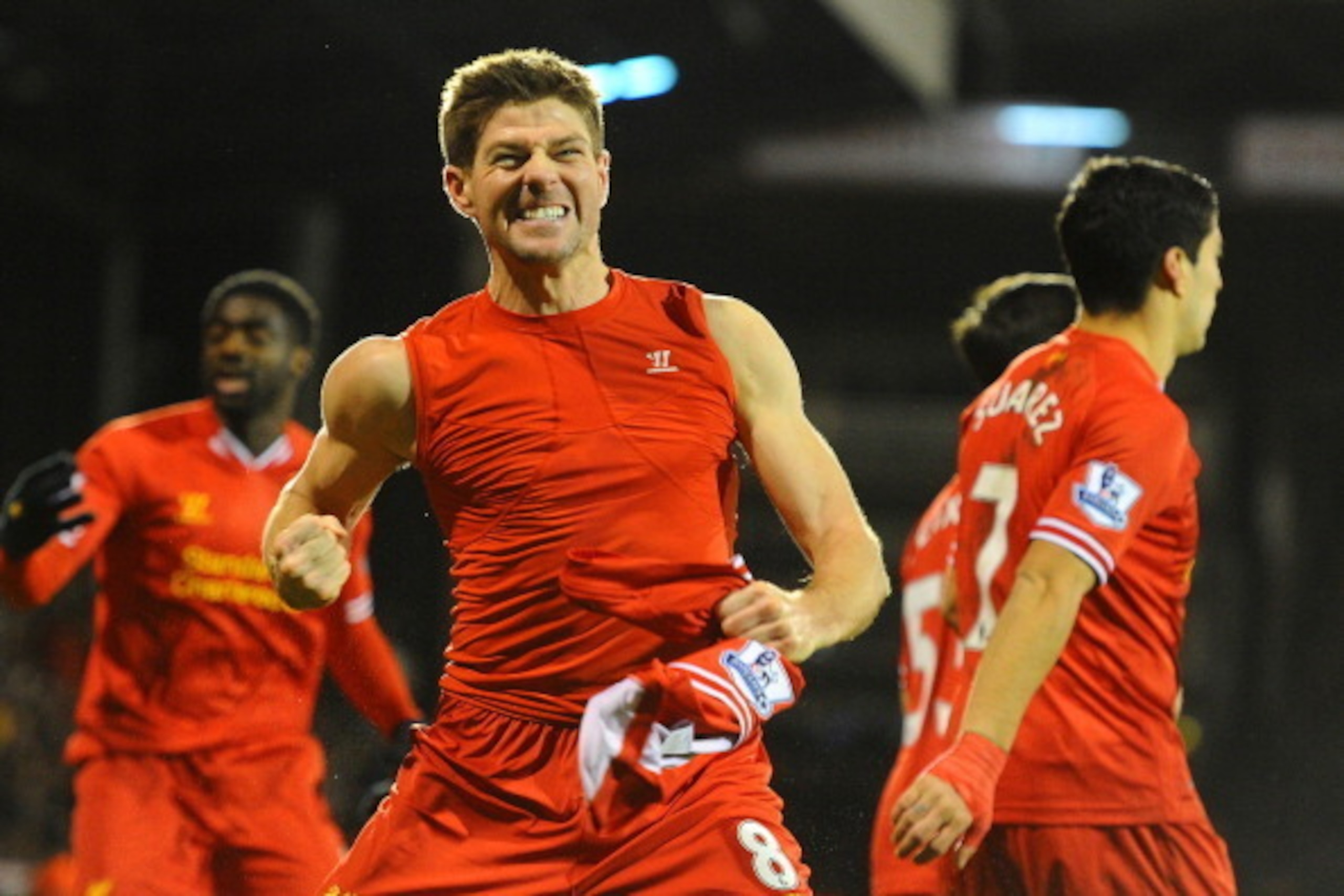 LONDON, ENGLAND - FEBRUARY 12:  Steven Gerrard of Liverpool celebrates scoring their third goal from the penalty spot during the Barclays Premier League match between Fulham and Liverpool at Craven Cottage on February 12, 2014 in London, England.  (Photo 