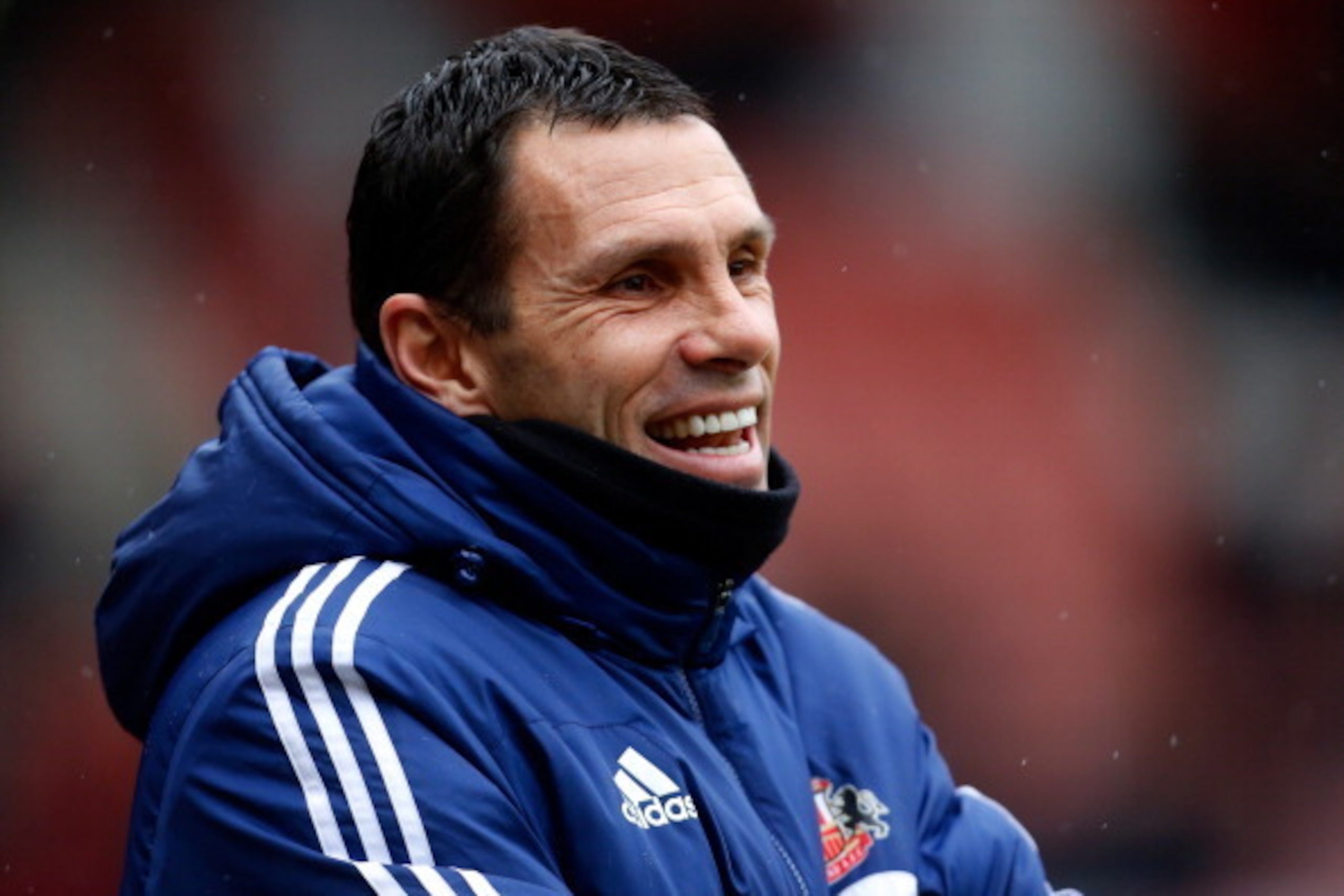SUNDERLAND, ENGLAND - FEBRUARY 15: Manager Gus Poyet of Sunderland smiles before the FA Cup Fifth Round match between Sunderland and Southampton at The Stadium of Light on February 15, 2014 in Sunderland, England. (Photo by Paul Thomas/Getty Images)
