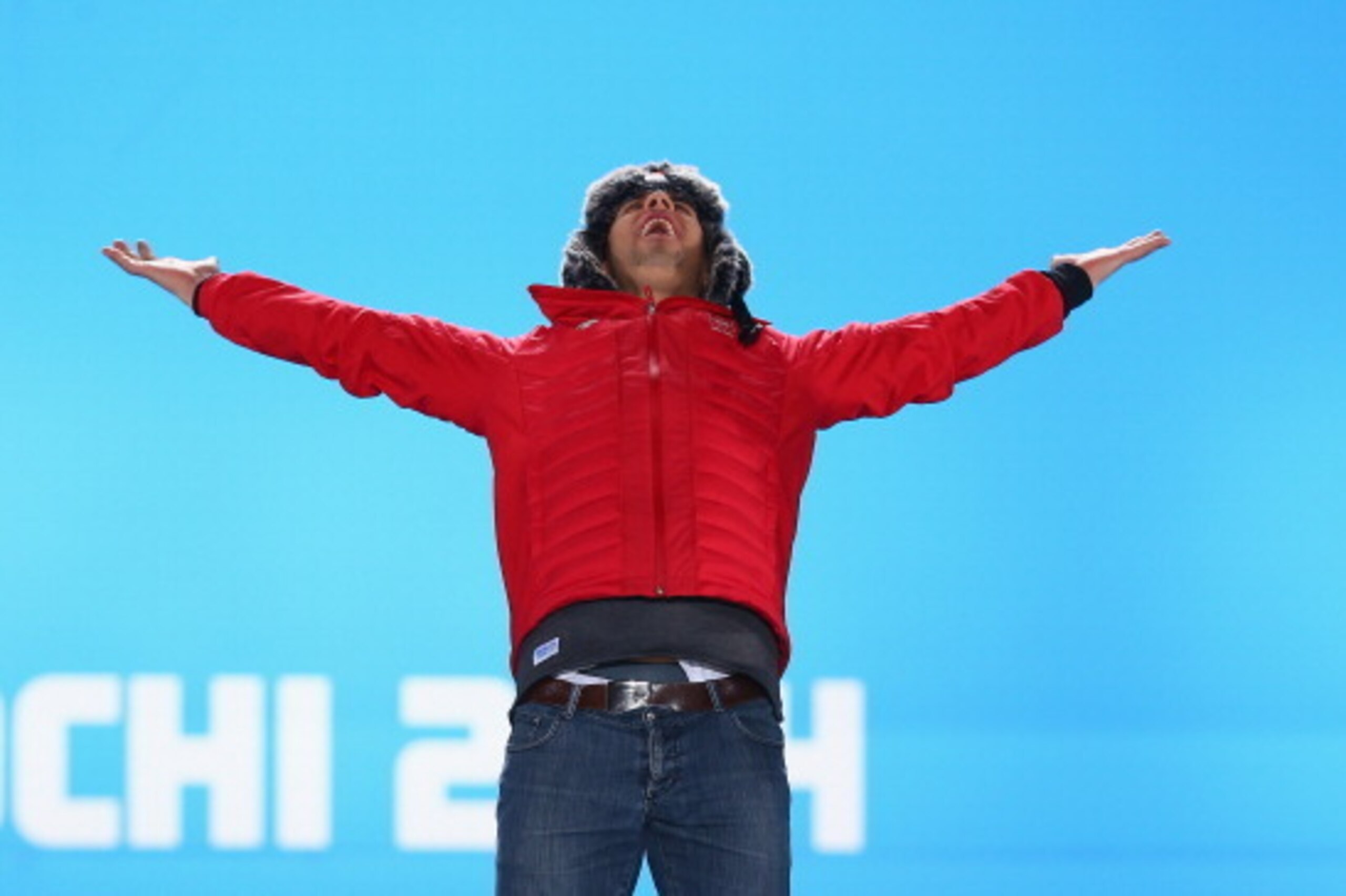 SOCHI, RUSSIA - FEBRUARY 15:  Gold medalist Sandro Viletta of Switzerland celebrates on the podium during the medal ceremony for the Alpine Skiing Men's Super Combined on day 8 of the Sochi 2014 Winter Olympics at Medals Plaza on February 15, 2014 in Soch