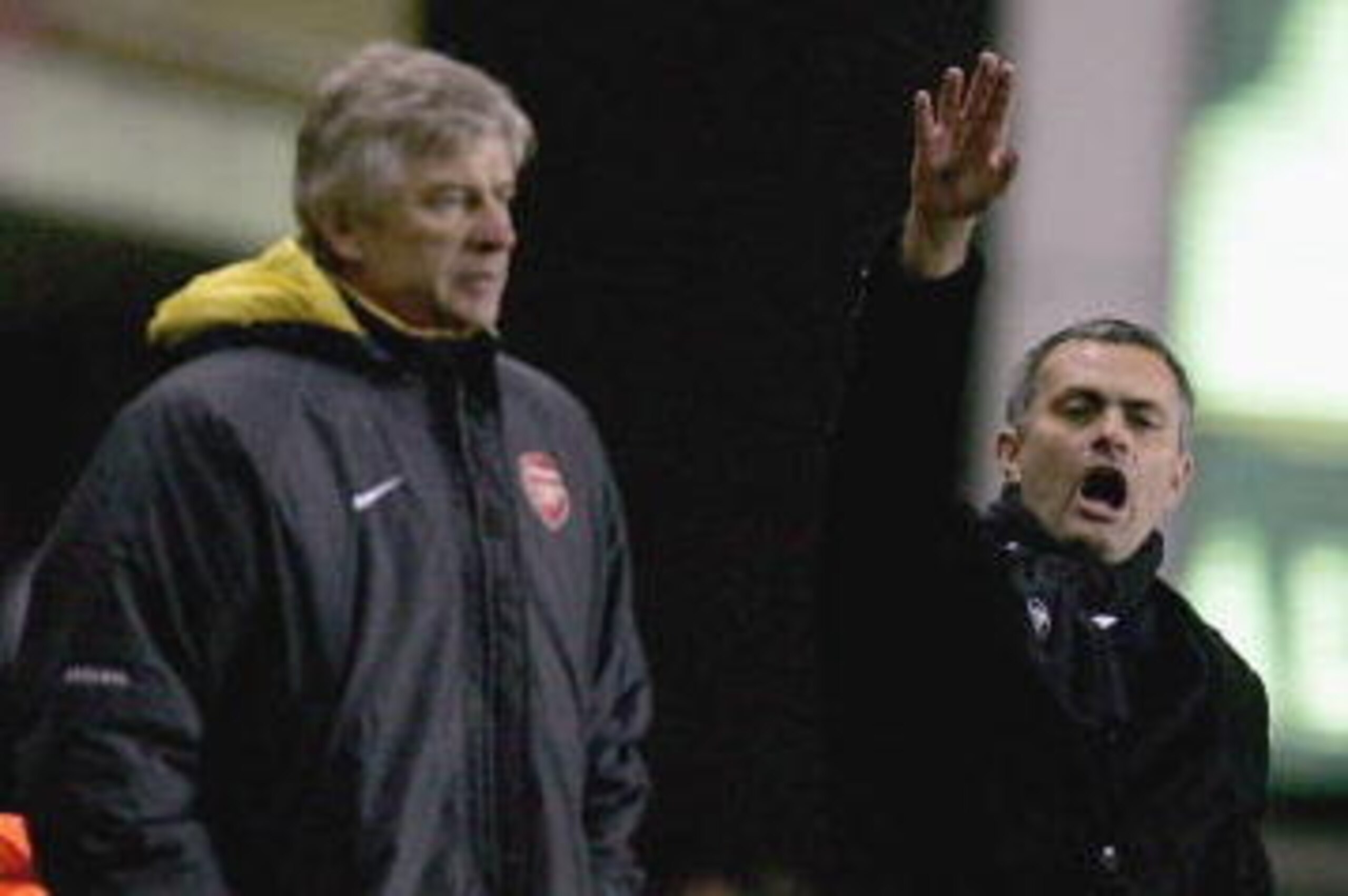 LONDON - DECEMBER 18:  Arsenal Manager Arsene Wenger (L) and Chelsea Manager Jose Mourinho (R) give instructions from the sidelines during the Barclays Premiership match between Arsenal and Chelsea at Highbury on December 18, 2005 in London, England.  (Ph