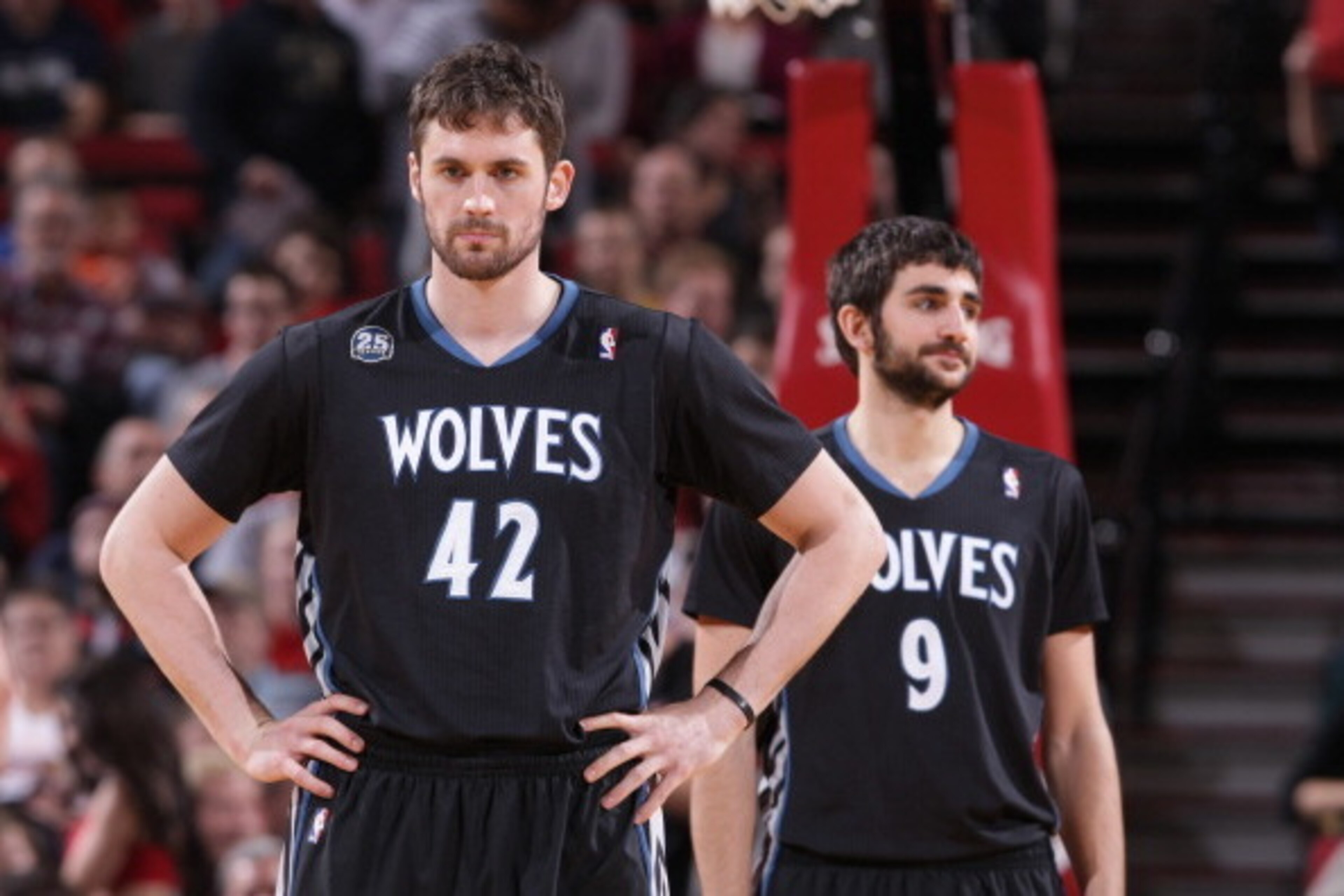 PORTLAND, OR - JANUARY 25:  Kevin Love #42 of the Minnesota Timberwolves stands on the court during the game against the Portland Trail Blazers on January 25, 2014 at the Moda Center Arena in Portland, Oregon. NOTE TO USER: User expressly acknowledges and