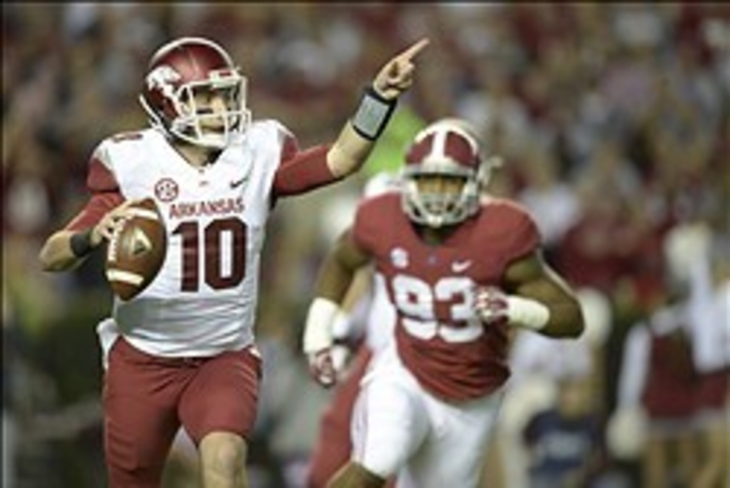 Oct 19, 2013; Tuscaloosa, AL, USA; Arkansas Razorbacks quarterback Brandon Allen (10) scrambles under pressure from Alabama Crimson Tide linebacker Jonathan Allen (93) during the first quarter at Bryant-Denny Stadium. Mandatory Credit: John David Mercer-U Oct 19, 2013; Tuscaloosa, AL, USA; Arkansas Razorbacks quarterback Brandon Allen (10) scrambles under pressure from Alabama Crimson Tide linebacker Jonathan Allen (93) during the first quarter at Bryant-Denny Stadium. Mandatory Credit: John David Mercer-U