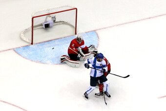SOCHI, RUSSIA - FEBRUARY 16:  Tuomo Ruutu #15 of Finland scores a goal in the second period against Carey Price #31 of Canada during the Men's Ice Hockey Preliminary Round Group B game on day nine of the Sochi 2014 Winter Olympics at Bolshoy Ice Dome on F