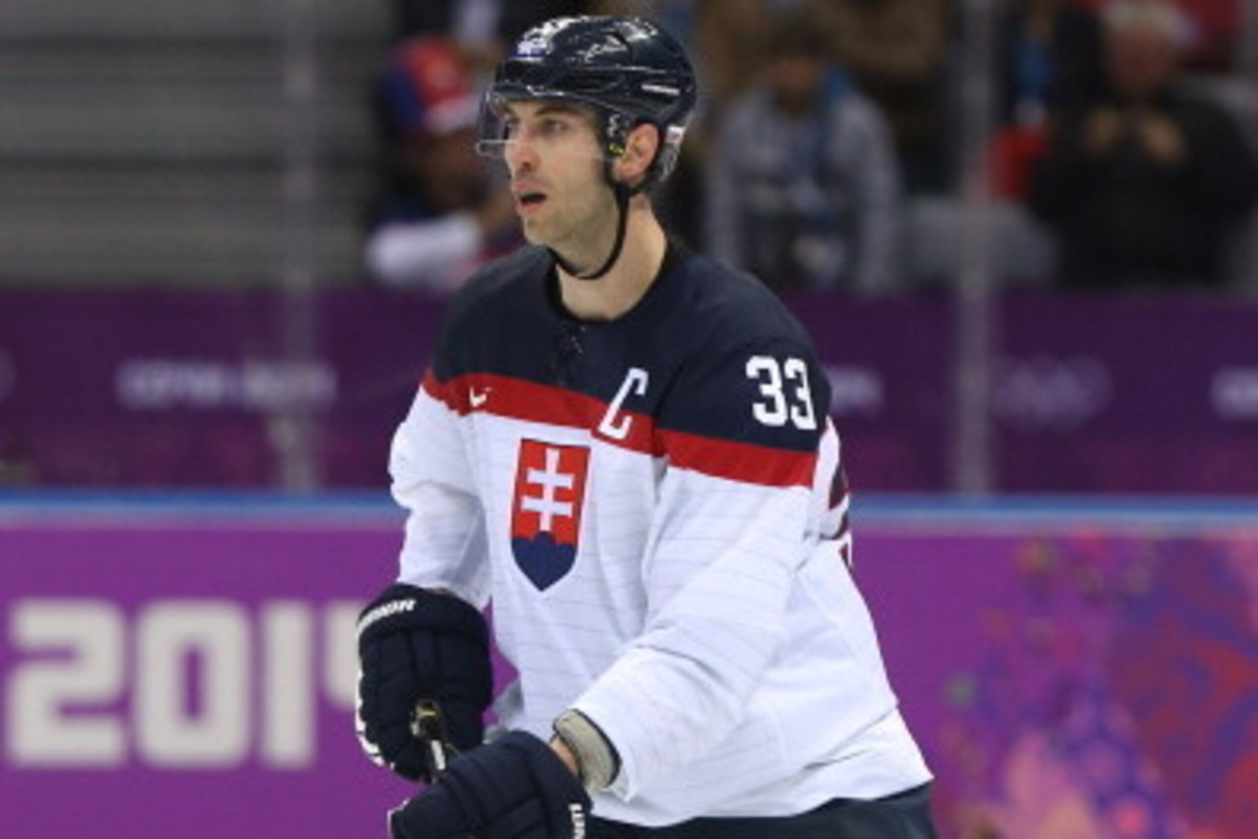 SOCHI, RUSSIA - FEBRUARY 15: Zdeno Chara #33 of Slovakia skates against Slovenia in the third period during the Men's Ice Hockey Preliminary Round Group A game on day eight of the Sochi 2014 Winter Olympics at Bolshoy Ice Dome on February 15, 2014 in Soc SOCHI, RUSSIA - FEBRUARY 15: Zdeno Chara #33 of Slovakia skates against Slovenia in the third period during the Men's Ice Hockey Preliminary Round Group A game on day eight of the Sochi 2014 Winter Olympics at Bolshoy Ice Dome on February 15, 2014 in Soc
