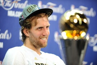 MIAMI, FL - JUNE 12: Dirk Nowitzki #41 of the Dallas Mavericks talks to the media following Game Six of the 2011 NBA Finals on June 12, 2011 at the American Airlines Arena in Miami, Florida. The Dallas Mavericks defeated the Miami Heat 105-95 to win the N