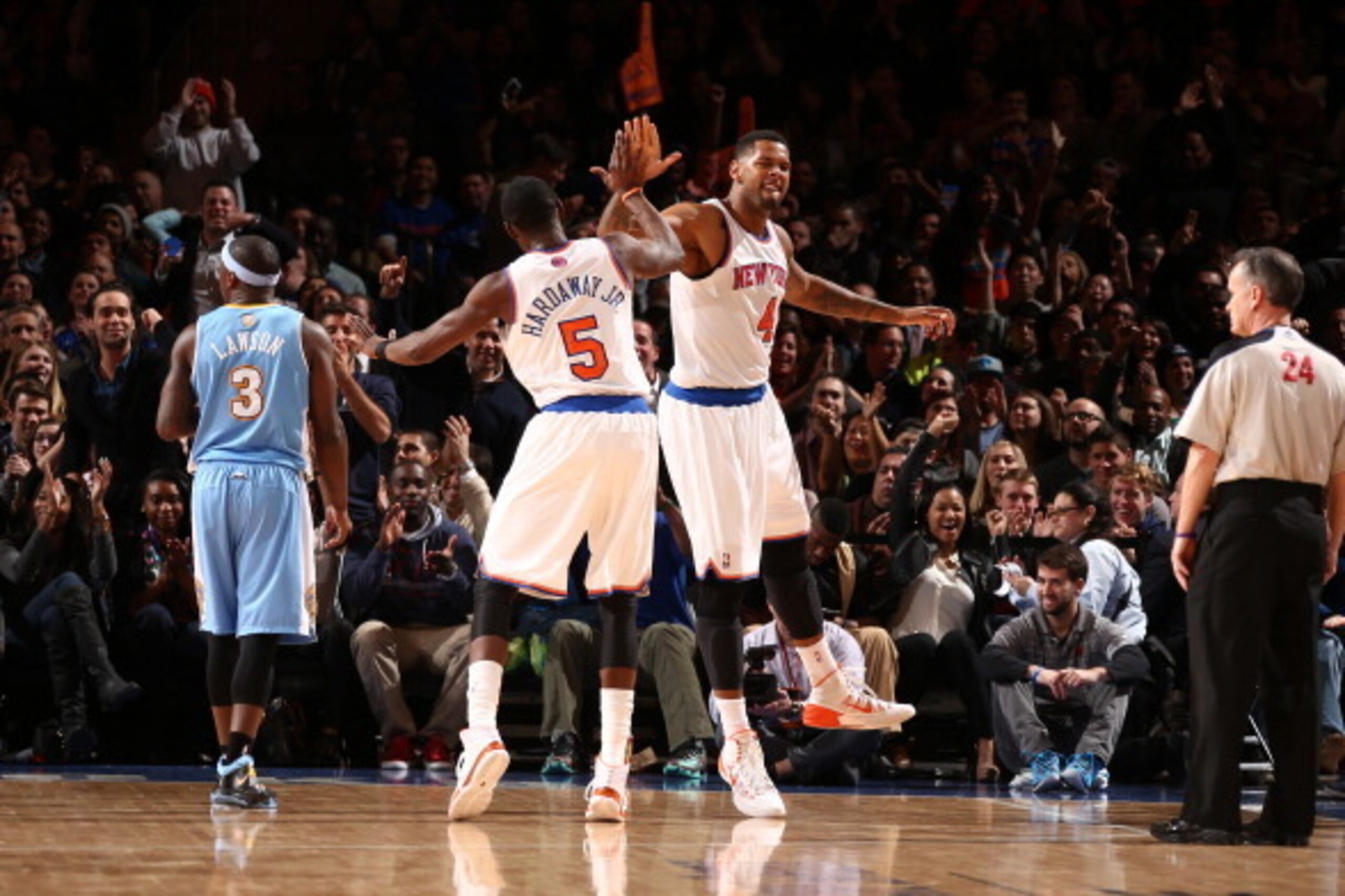 NEW YORK, NY - FEBRUARY 07: Jeremy Tyler #4 of the New York Knicks gives teammate Tim Hardaway Jr. #5 a high-five during a game against of Denver Nuggets at Madison Square Garden in New York City on February 07, 2014. NOTE TO USER: User expressly acknow NEW YORK, NY - FEBRUARY 07: Jeremy Tyler #4 of the New York Knicks gives teammate Tim Hardaway Jr. #5 a high-five during a game against of Denver Nuggets at Madison Square Garden in New York City on February 07, 2014. NOTE TO USER: User expressly acknow