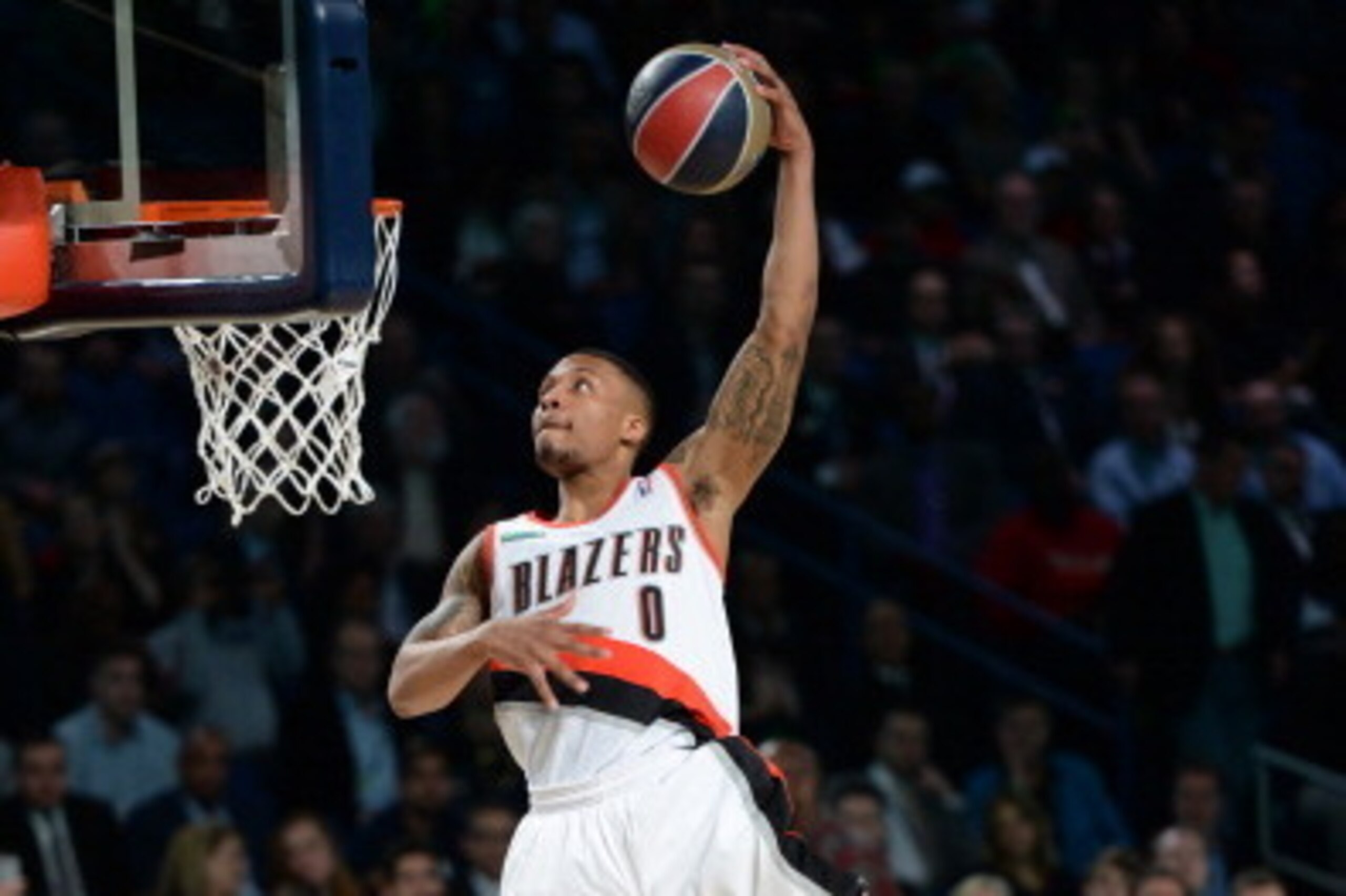 NEW ORLEANS, LA - FEBRUARY 15:  Damian Lillard #0 of the Portland Trail Blazers participates in the Sprite Slam Dunk Contest on State Farm All-Star Saturday Night as part of the 2014 All-Star Weekend at Smoothie King Center on February 15, 2014 in New Orl