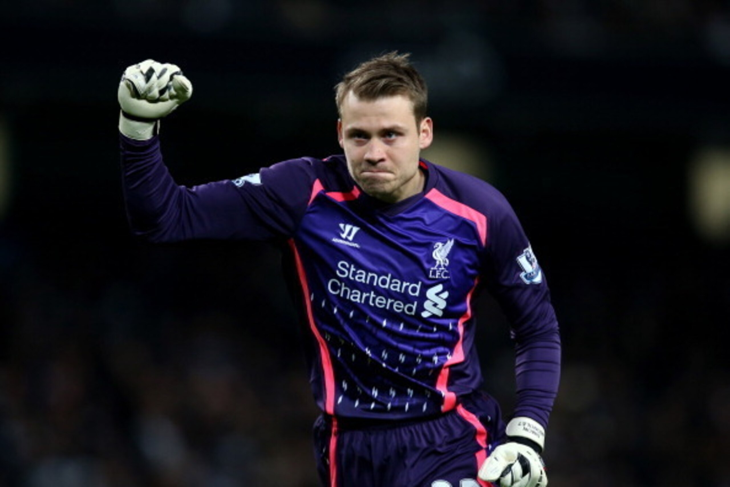 MANCHESTER, ENGLAND - DECEMBER 26: Simon Mignolet, Goalkeeper of Liverpool celebrates the opening goal by team mate Philippe Coutinho during the Barclays Premier League match between Manchester City and Liverpool at the Etihad Stadium on December 26, 201 MANCHESTER, ENGLAND - DECEMBER 26: Simon Mignolet, Goalkeeper of Liverpool celebrates the opening goal by team mate Philippe Coutinho during the Barclays Premier League match between Manchester City and Liverpool at the Etihad Stadium on December 26, 201