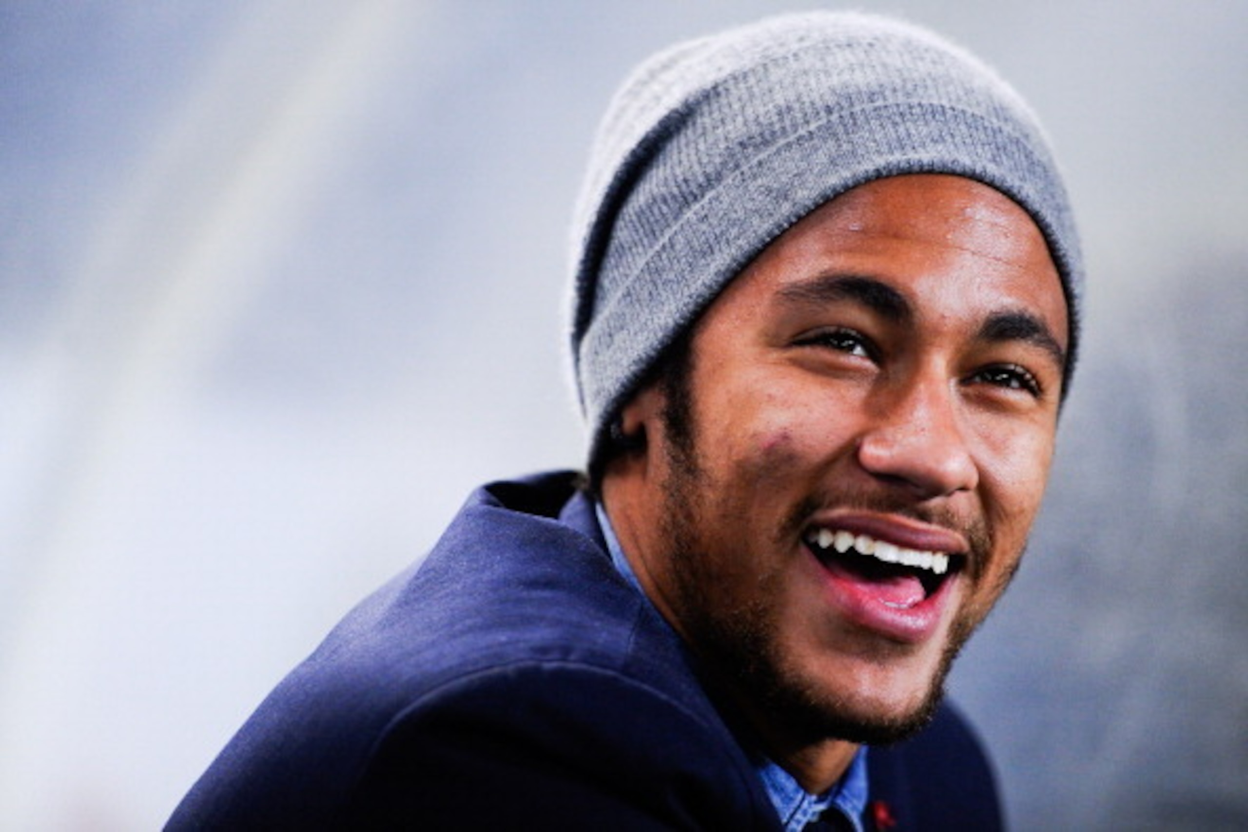 SAN SEBASTIAN, SPAIN - FEBRUARY 12:  Neymar of FC Barcelona looks on from the bench prior to the Copa del Rey Semi Final second leg between Real Sociedad and FC Barcelona at Anoeta Stadium on February 12, 2014 in San Sebastian, Spain.  (Photo by David Ram