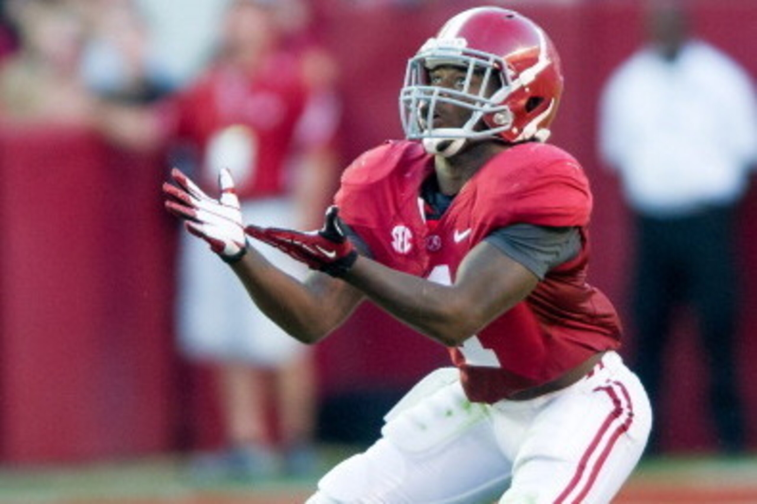 TUSCALOOSA, AL - SEPTEMBER 22:  Running back Dee Hart #1 of the Alabama Crimson Tide catches a punt while playing against the Florida Atlantic Owls on September 22, 2012 at Bryant-Denny Stadium in Tuscaloosa, Alabama. Alabama defeated Florida Atlantic 40-