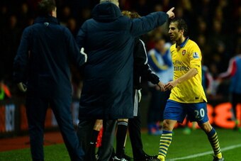 SOUTHAMPTON, ENGLAND - JANUARY 28:  Mathieu Flamini of Arsenal leaves the field after receiving a red card during the Barclays Premier League match between Southampton and Arsenal at St Mary's Stadium on January 28, 2014 in Southampton, England.  (Photo b
