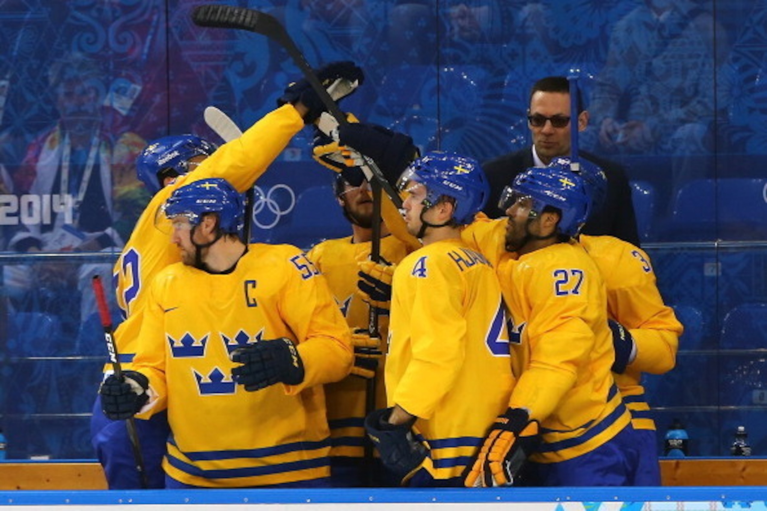 SOCHI, RUSSIA - FEBRUARY 15: Sweden celebrates a goal by Patrik Berglund #14 of Sweden in the first period against Latvia during the Men's Ice Hockey Preliminary Round Group C game on day eight of the Sochi 2014 Winter Olympics at Shayba Arena on February
