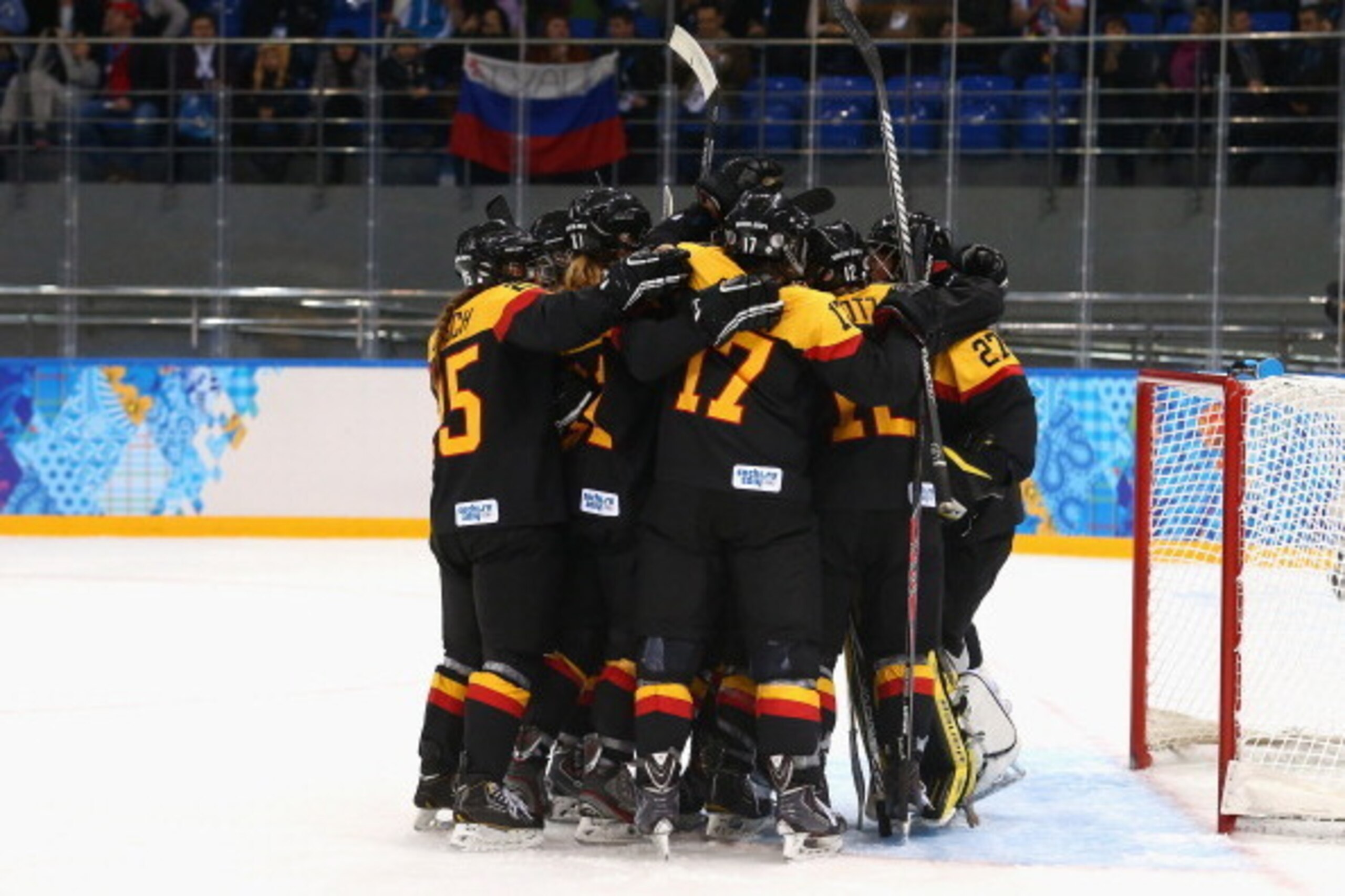 SOCHI, RUSSIA - FEBRUARY 18: Germany celebrate after beating Japan 3-2 during the Women's Classifications Game on day 11 of the Sochi 2014 Winter Olympics at Shayba Arena on February 18, 2014 in Sochi, Russia.  (Photo by Ryan Pierse/Getty Images)